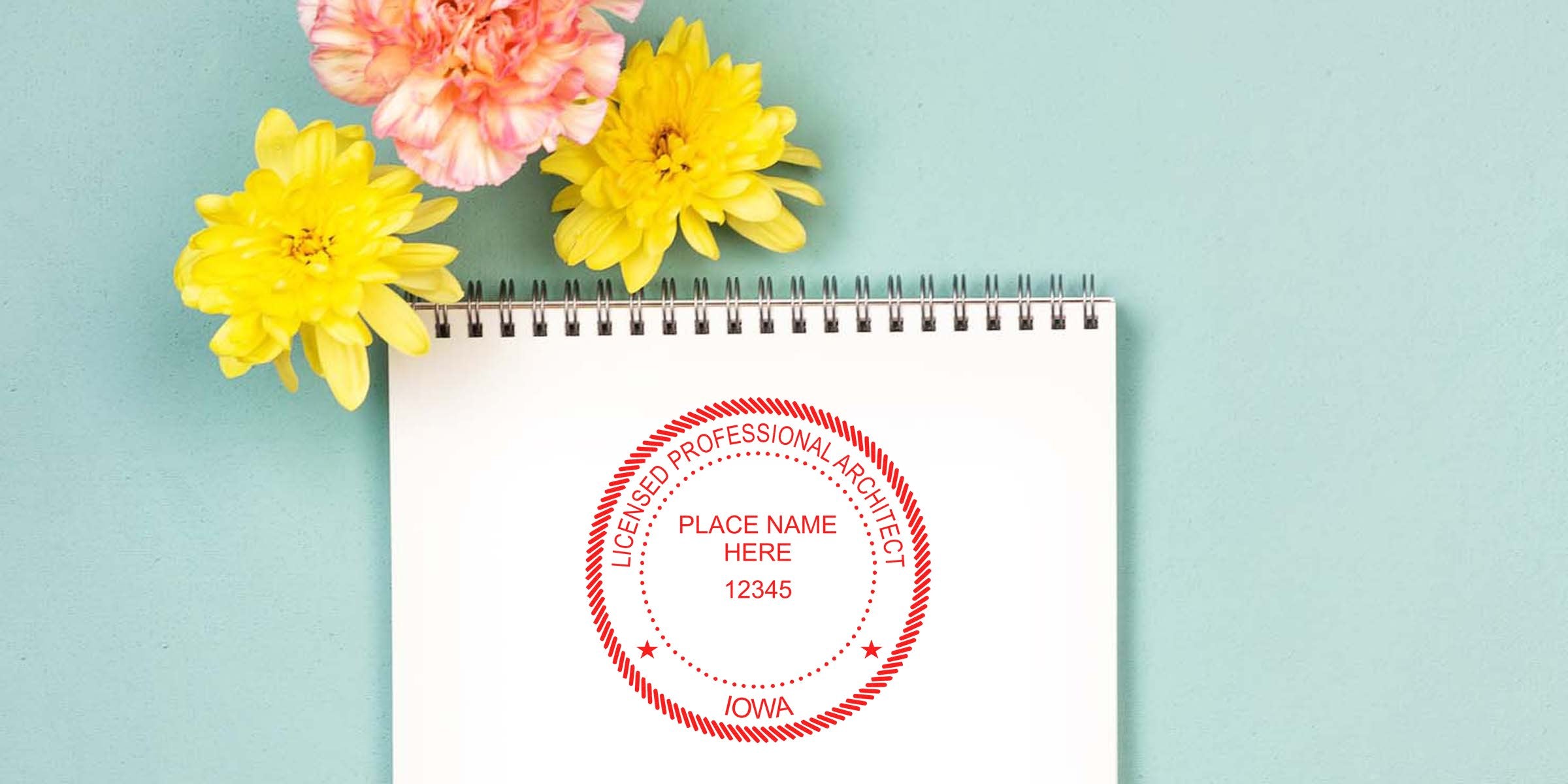 Licensed architect stamp on notebook with flowers, showing Iowa architect stamp cost and pricing details.