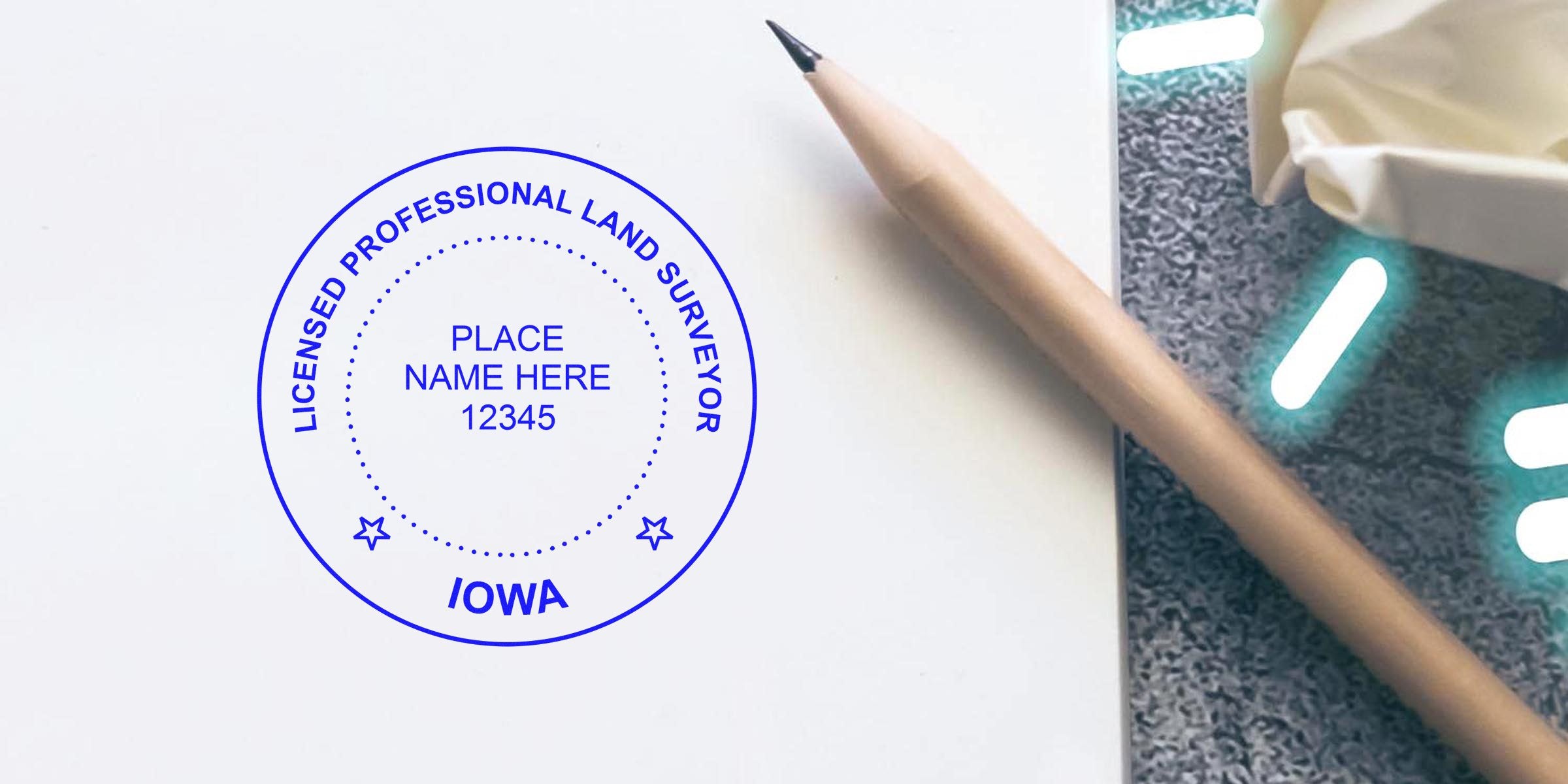 Iowa land surveyor stamp with pencil on white paper, symbolizing land surveyor standards and expert surveying services.