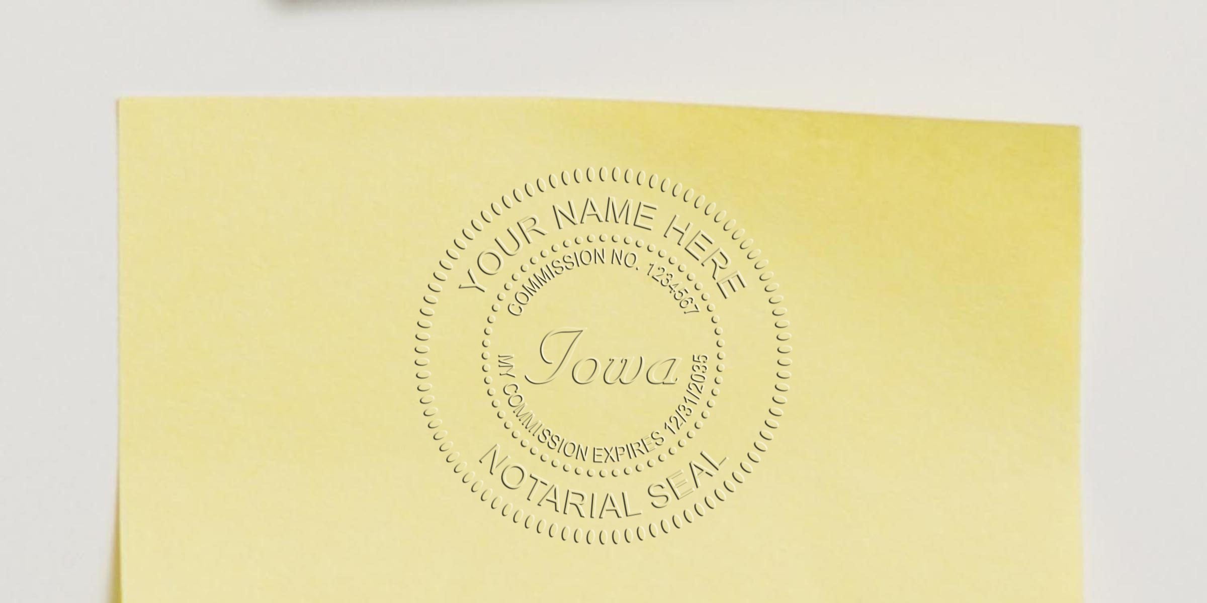 Iowa notary seal embossed on yellow paper, symbolizing the top official seal for notarization and legal document certification in Iowa.