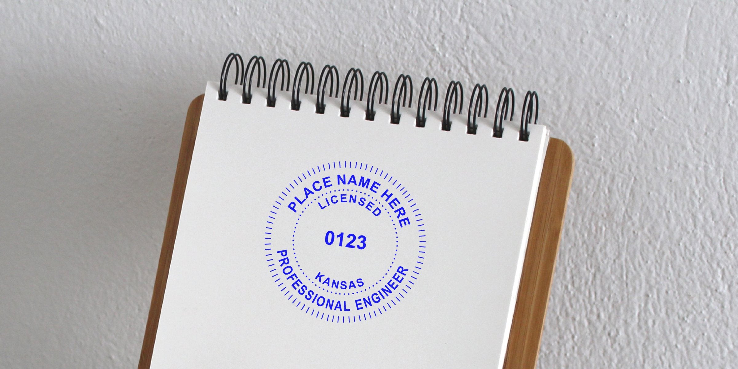 Kansas licensed professional engineer stamp on spiral notebook from top engineer stamp shop.