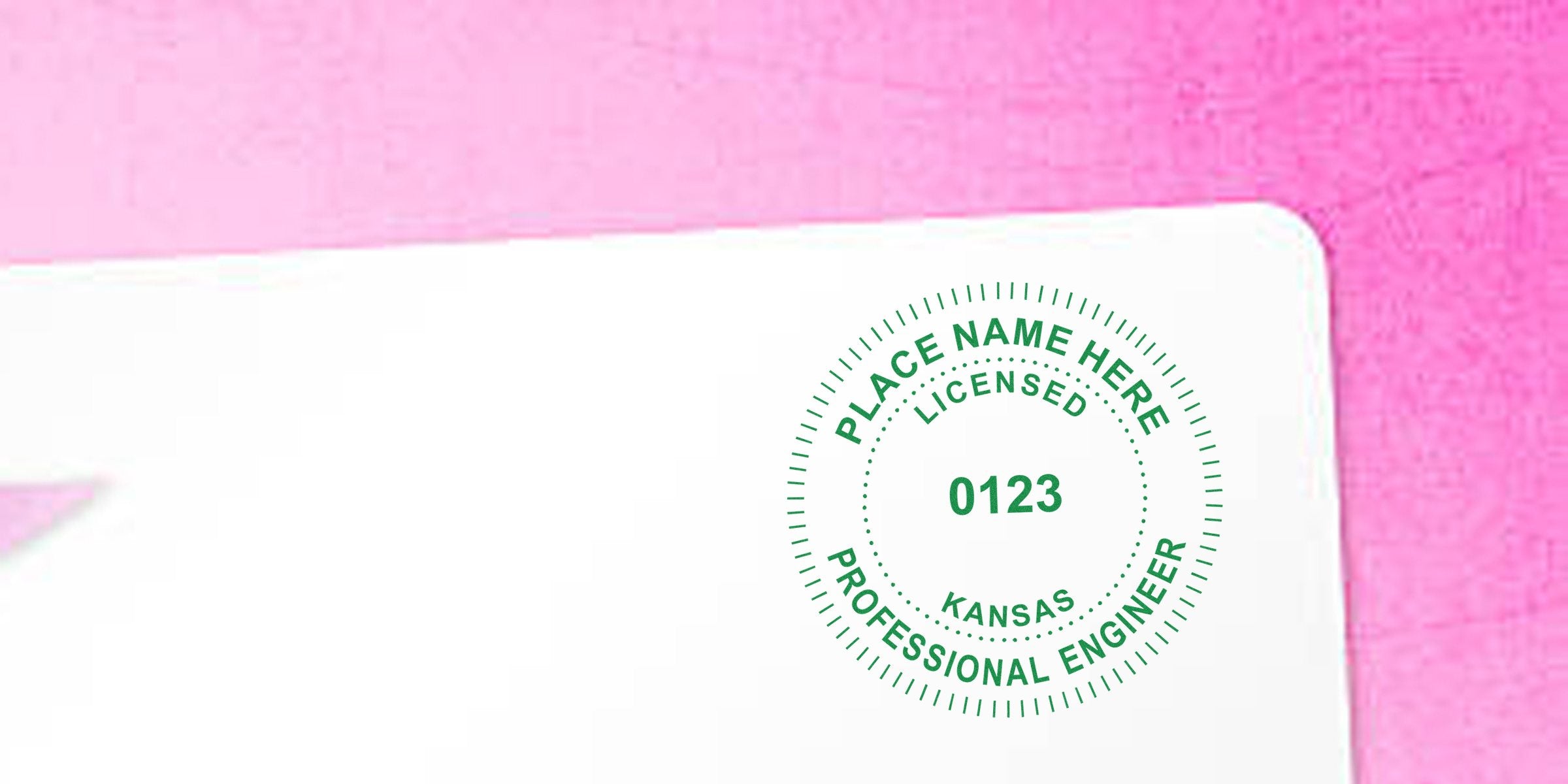 Kansas custom engineer seals with a professional license stamp on white paper against a pink background, highlighting personalized engineer seals.