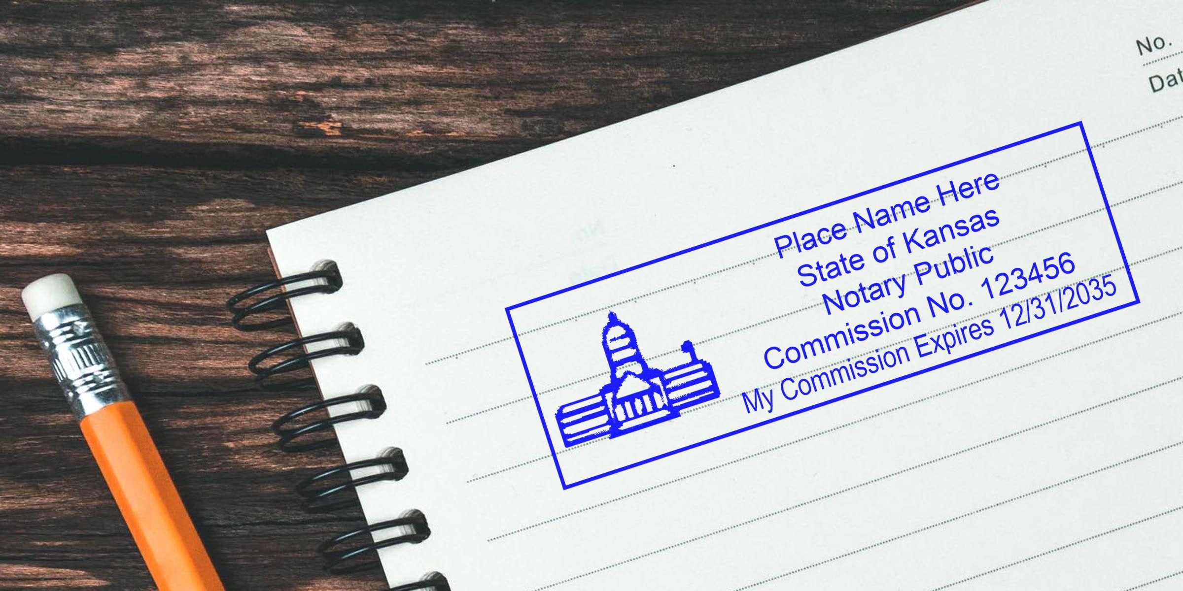 Kansas notary seal stamped on notebook page with pencil on wooden table. Buy Kansas notary seal now.