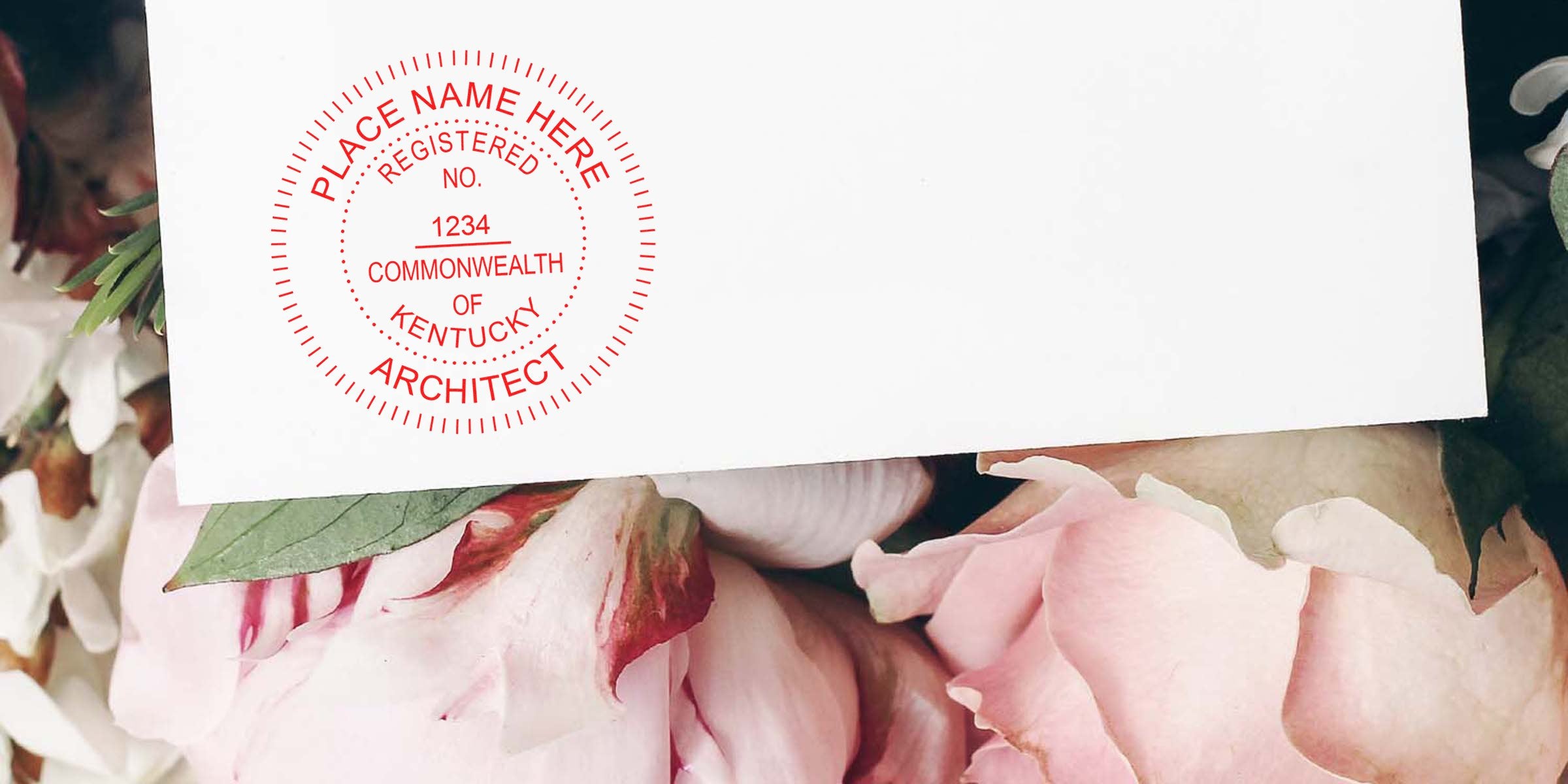 Kentucky architect seal on white paper with pink flowers, demonstrating compliance with architect seal rules.