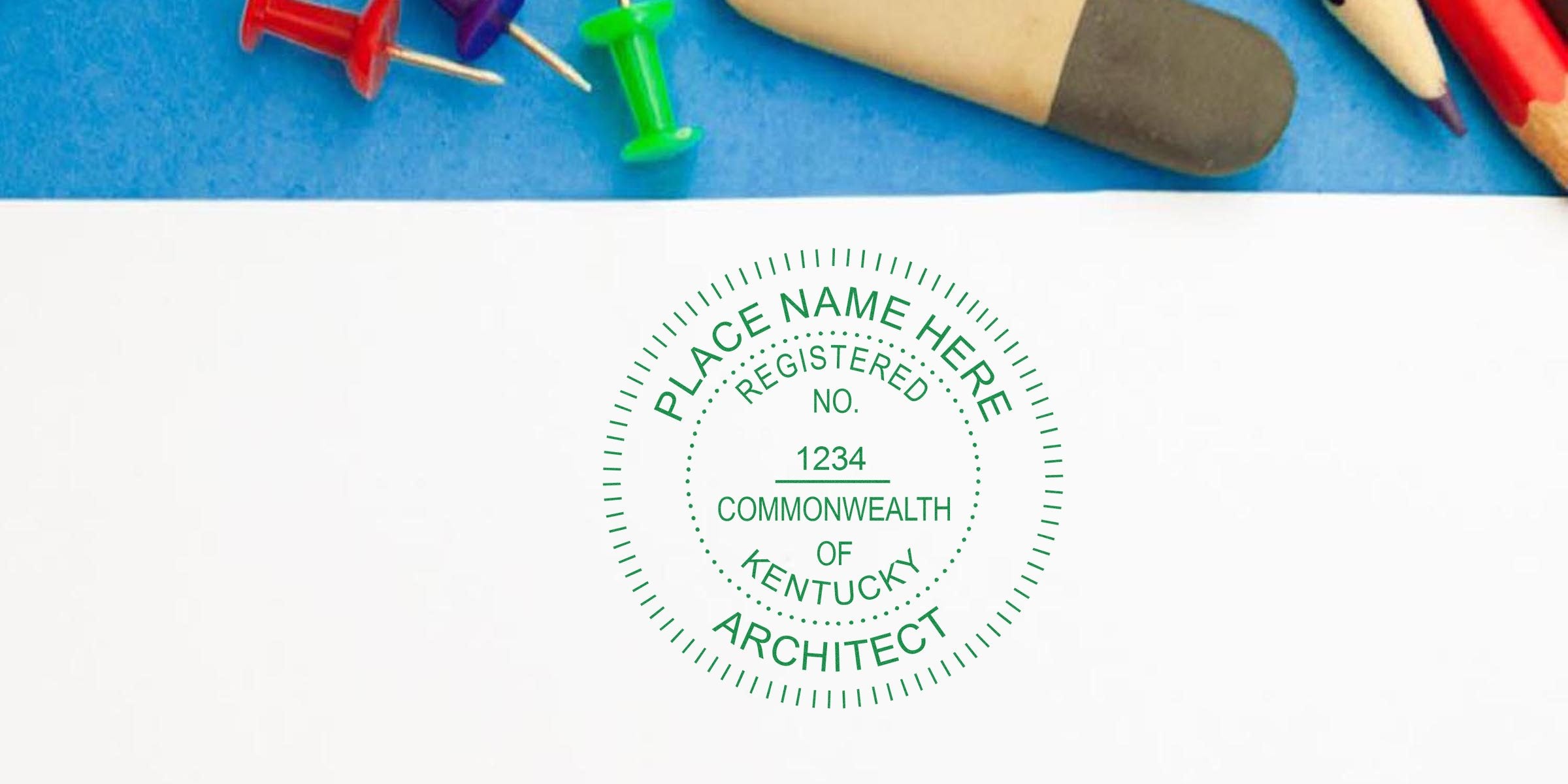 Kentucky architect registered seal on white paper with office supplies, highlighting Kentucky architect stamp laws and seal requirements.