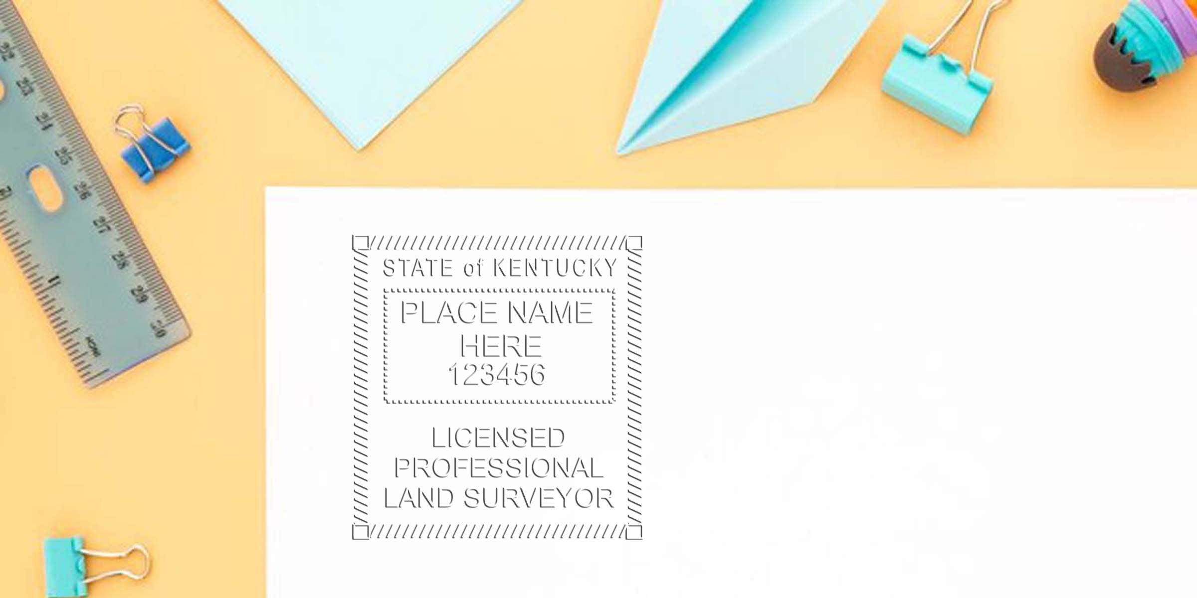 Kentucky land surveyor seal on a licensed stamp on white paper, with a ruler and office supplies on a yellow background, showing land surveyor seal tips.