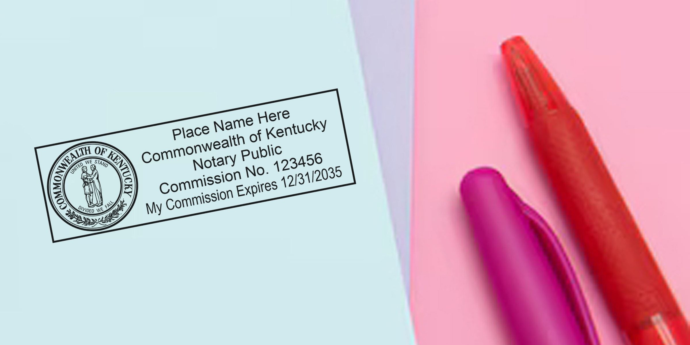 Kentucky notary stamp on blue paper with official seal, red and purple pens, notary commission seal, and expiration date.