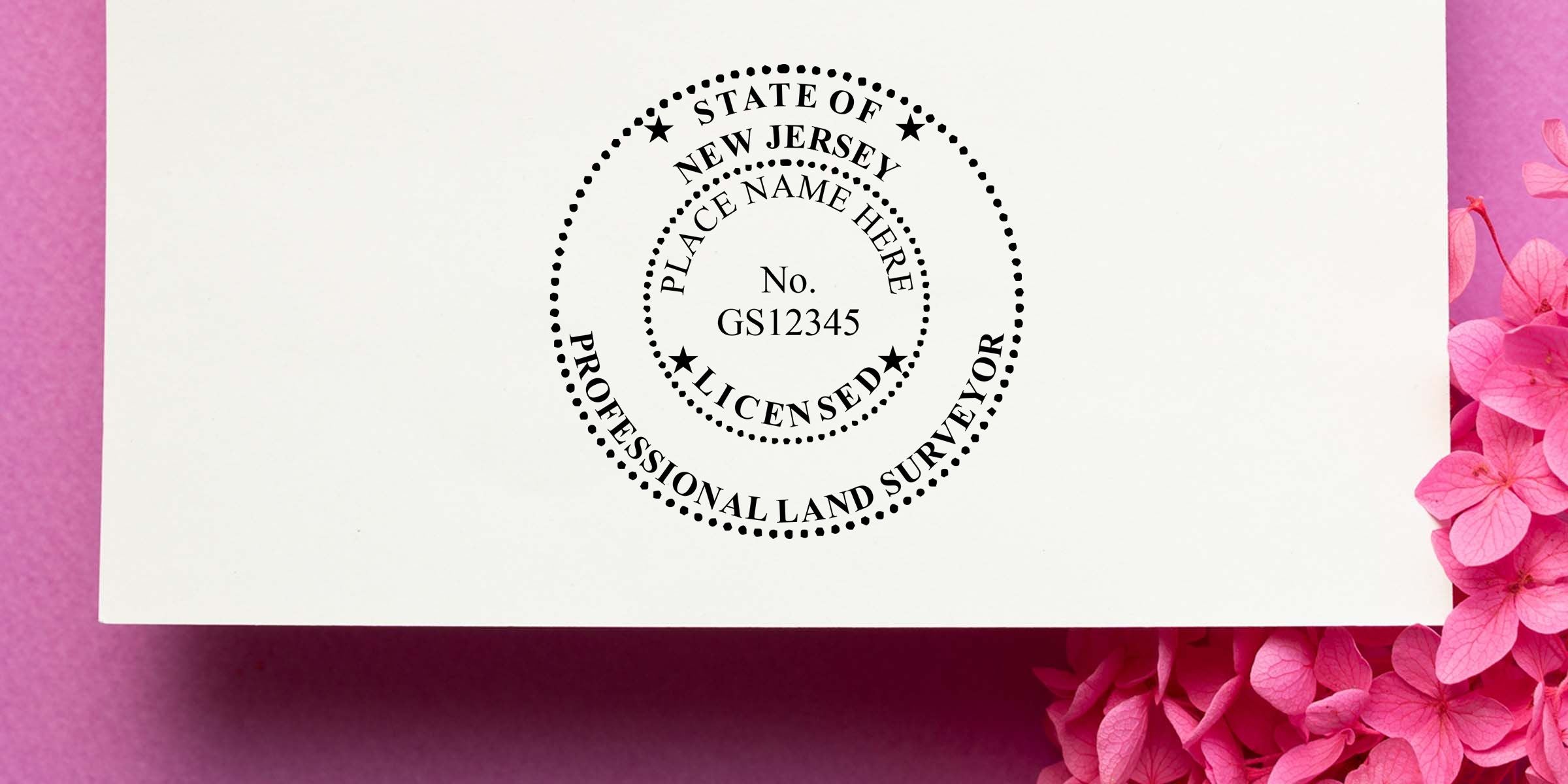 State of New Jersey professional land surveyor stamp template with license number GS12345 on white paper over pink floral background