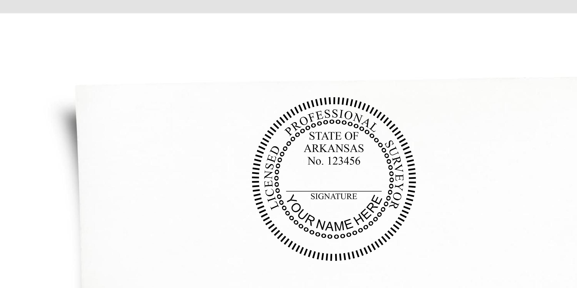 Arkansas professional surveyor seal stamp with license number 123456, signature line, and your name here text on white paper background