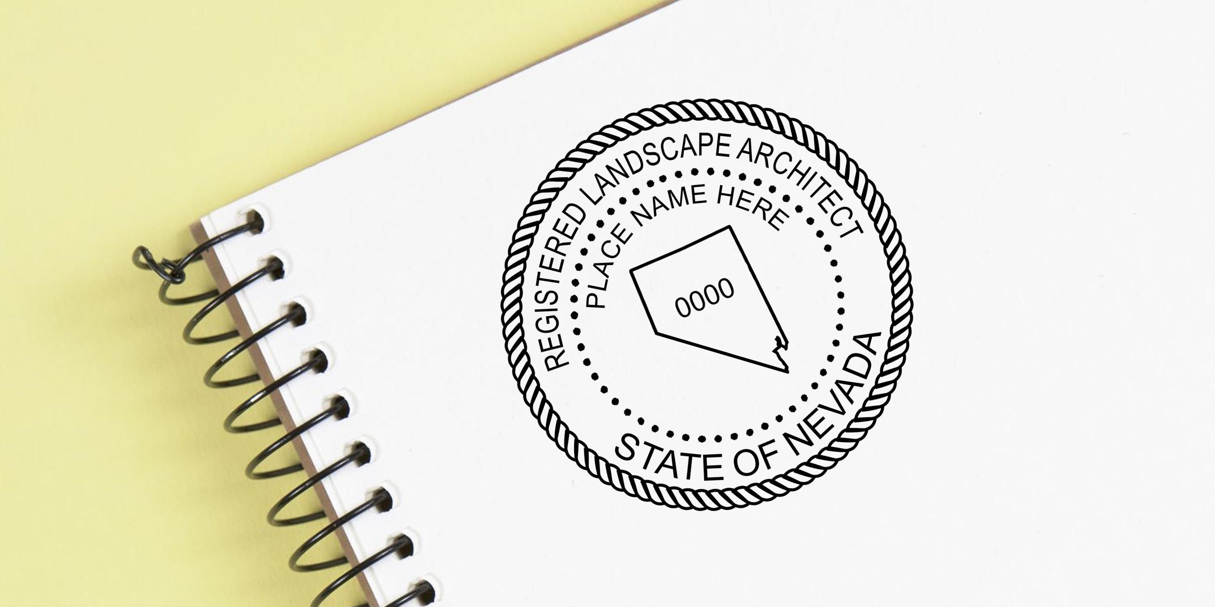 Nevada registered landscape architect seal on a spiral-bound notebook with custom place name and license number placeholder on a yellow background
