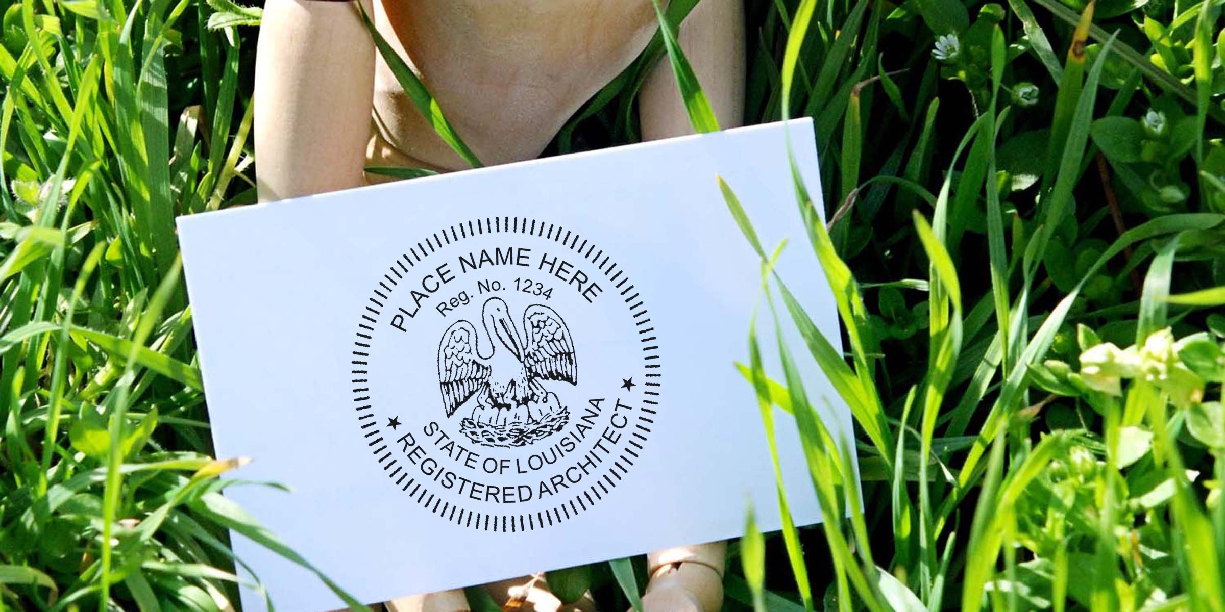 Louisiana architect seal on white card in green grass, showing Louisiana architect stamp cost and fees.