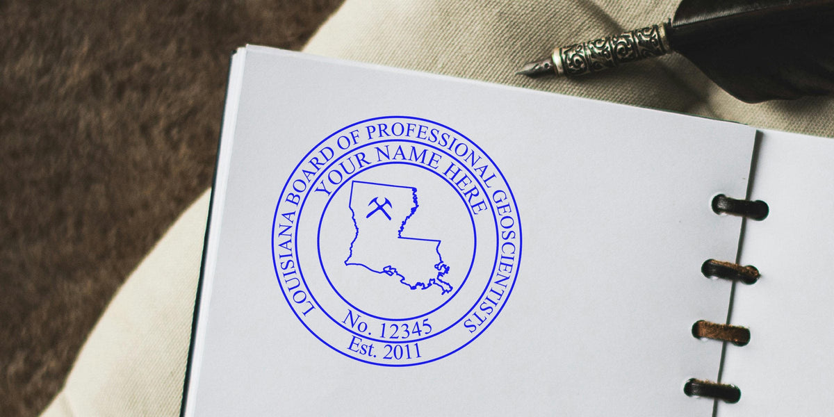 Louisiana Board of Professional Geoscientists seal on a notebook page with a vintage fountain pen and beige fabric, showcasing a custom geologist stamp.