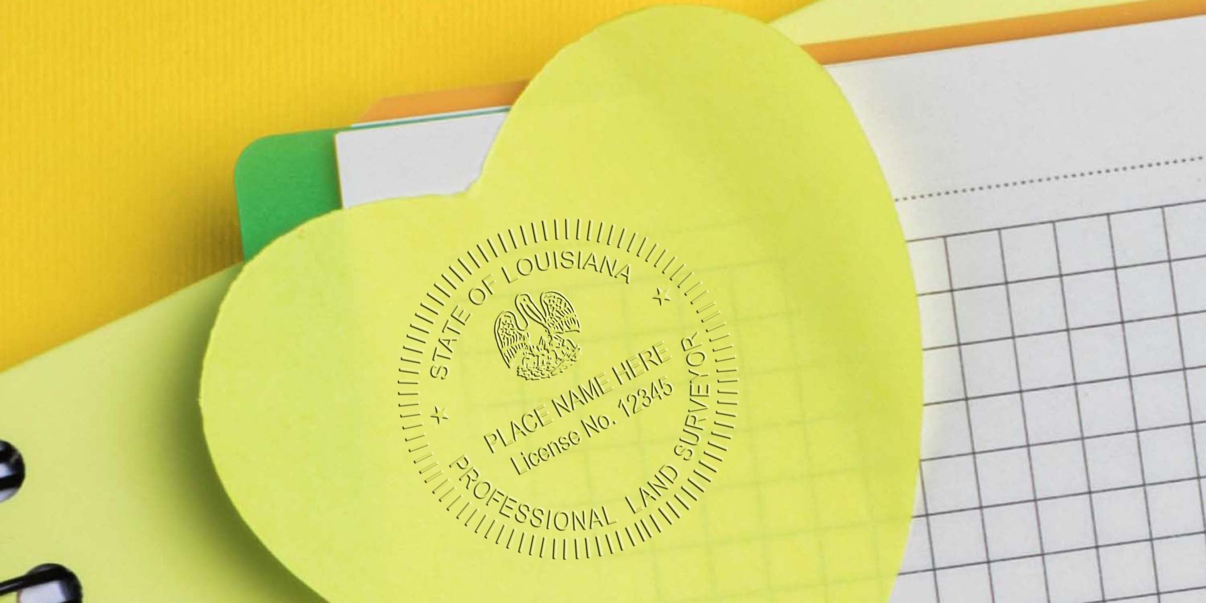 Yellow heart-shaped sticky note with land surveyor seal on graph paper, highlighting Louisiana surveyor regulations and stamp rules, with colorful folders blurred in the background.