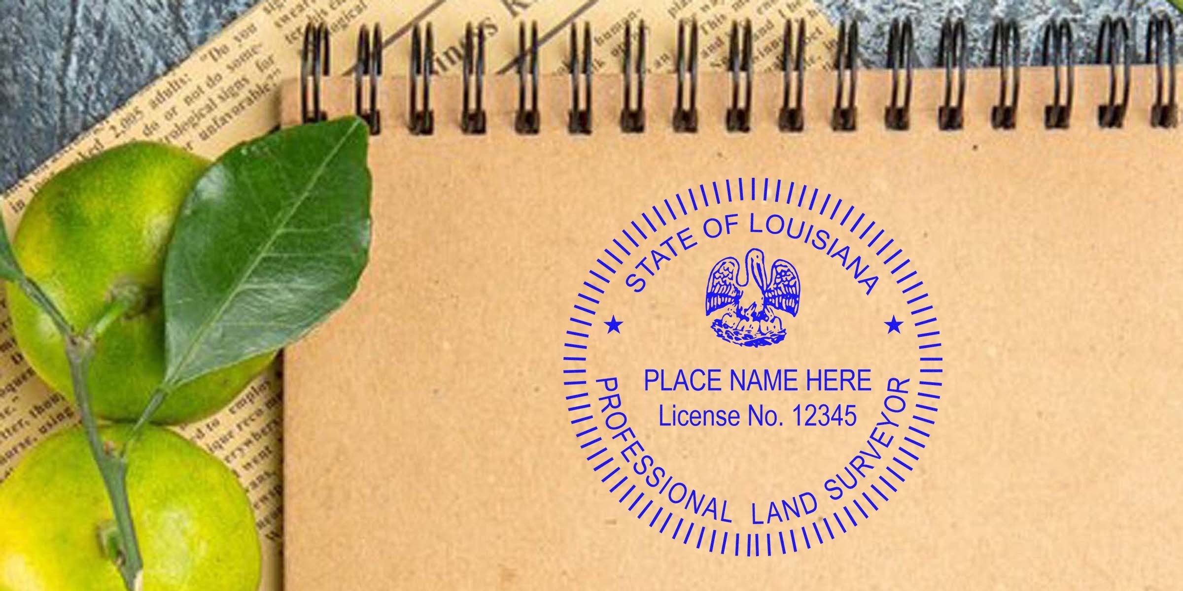 Louisiana land surveyor stamp on notebook with green citrus fruits and leaves, showing a land surveyor stamp template.