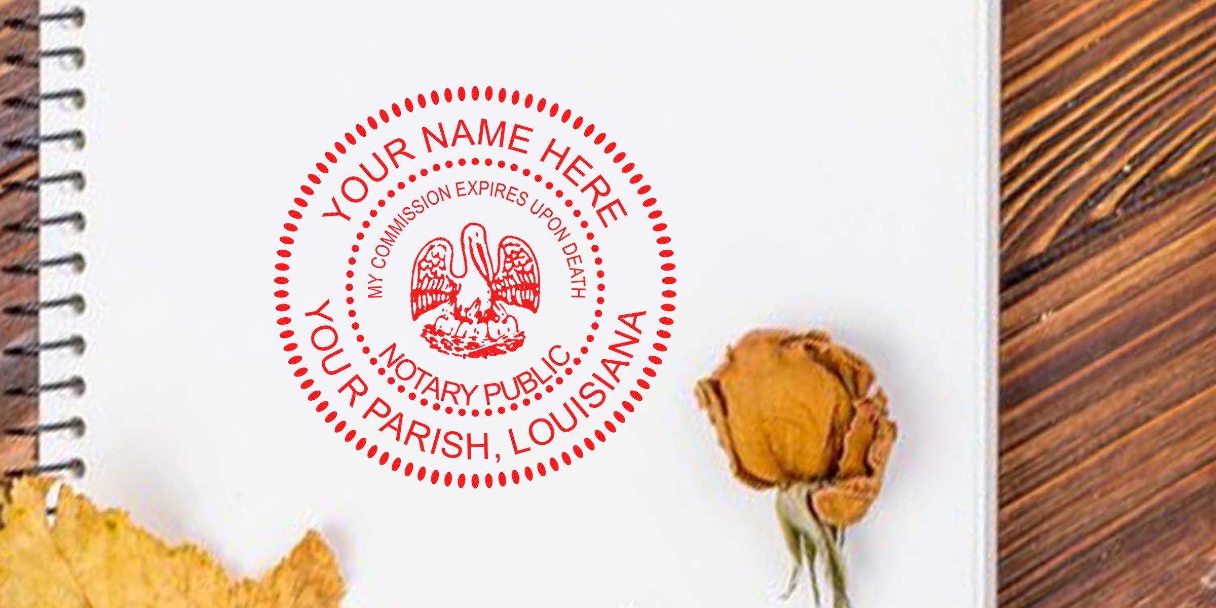 Louisiana notary stamp with custom name and parish on a notebook page, accompanied by a dried flower and autumn leaf—ideal for those referencing a notary stamp buying guide.