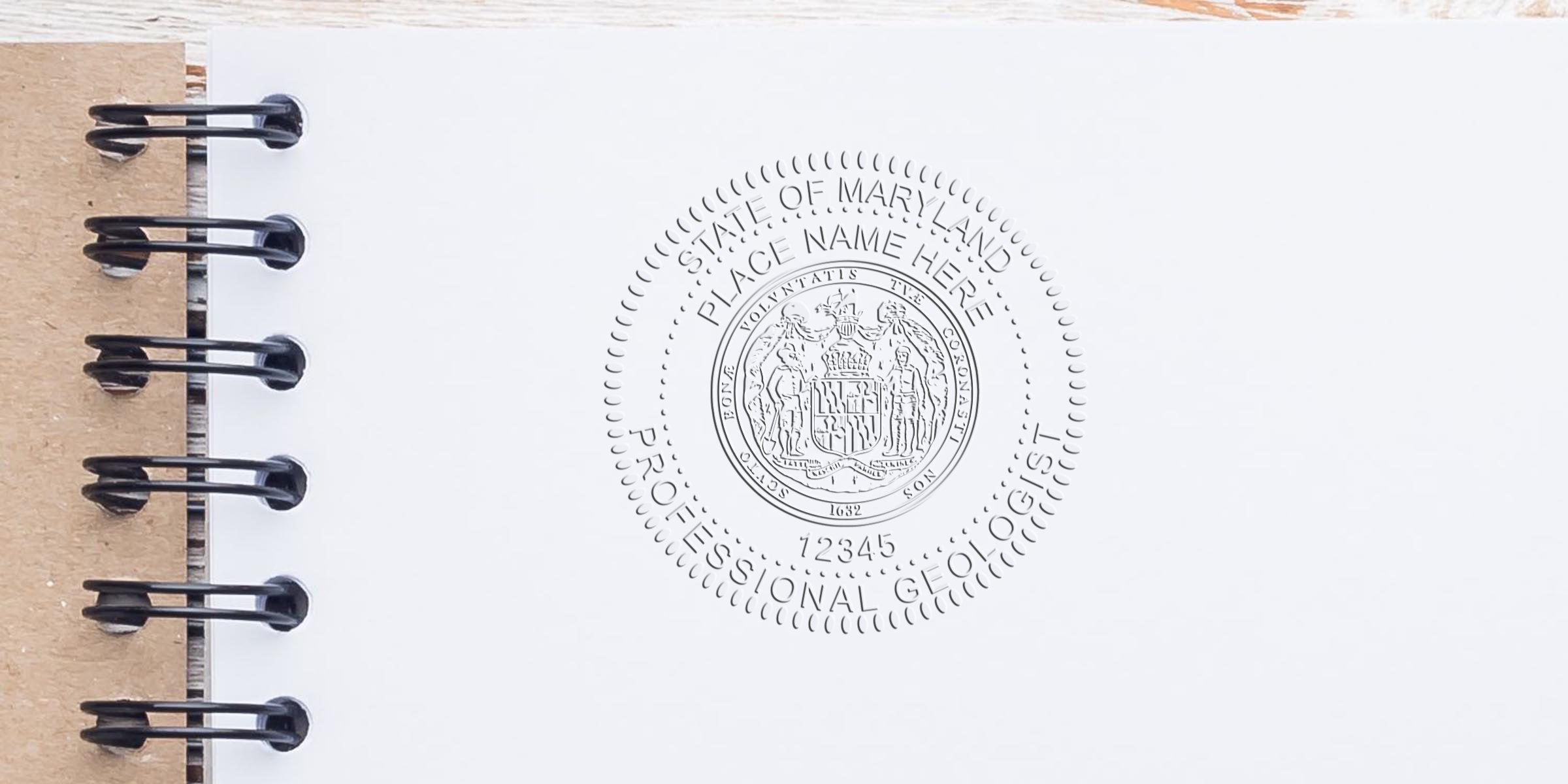 Embossed professional geologist seal on white paper with spiral binding, showing Maryland state certification stamp, meeting Maryland geologist stamp regulations and requirements.