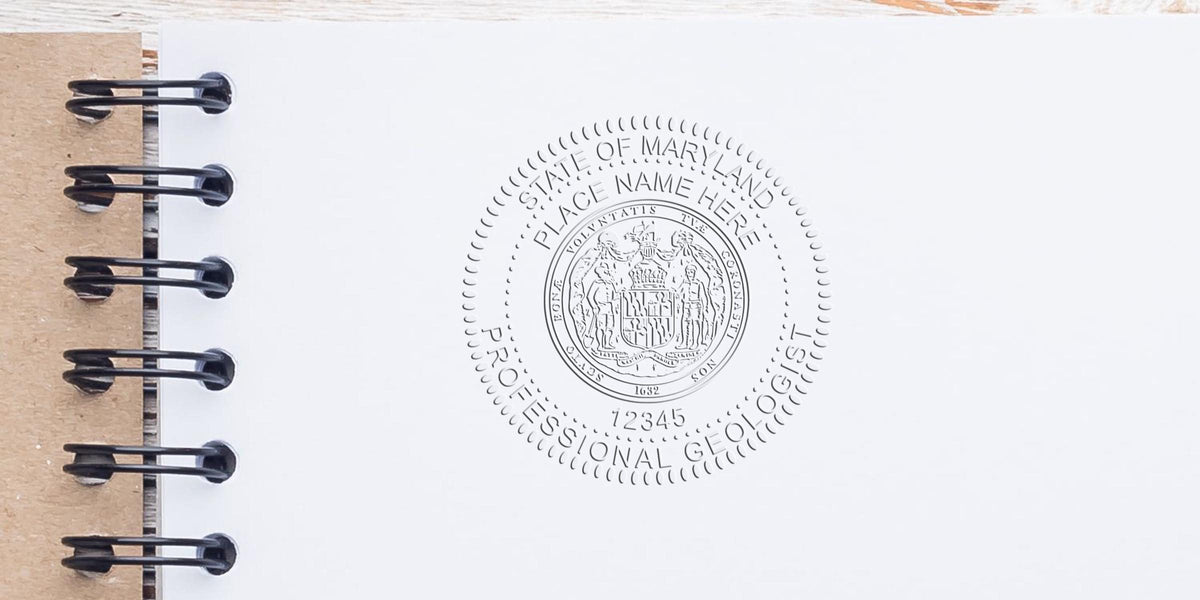 Embossed professional geologist seal on white paper with spiral binding, showing Maryland state certification stamp, meeting Maryland geologist stamp regulations and requirements.