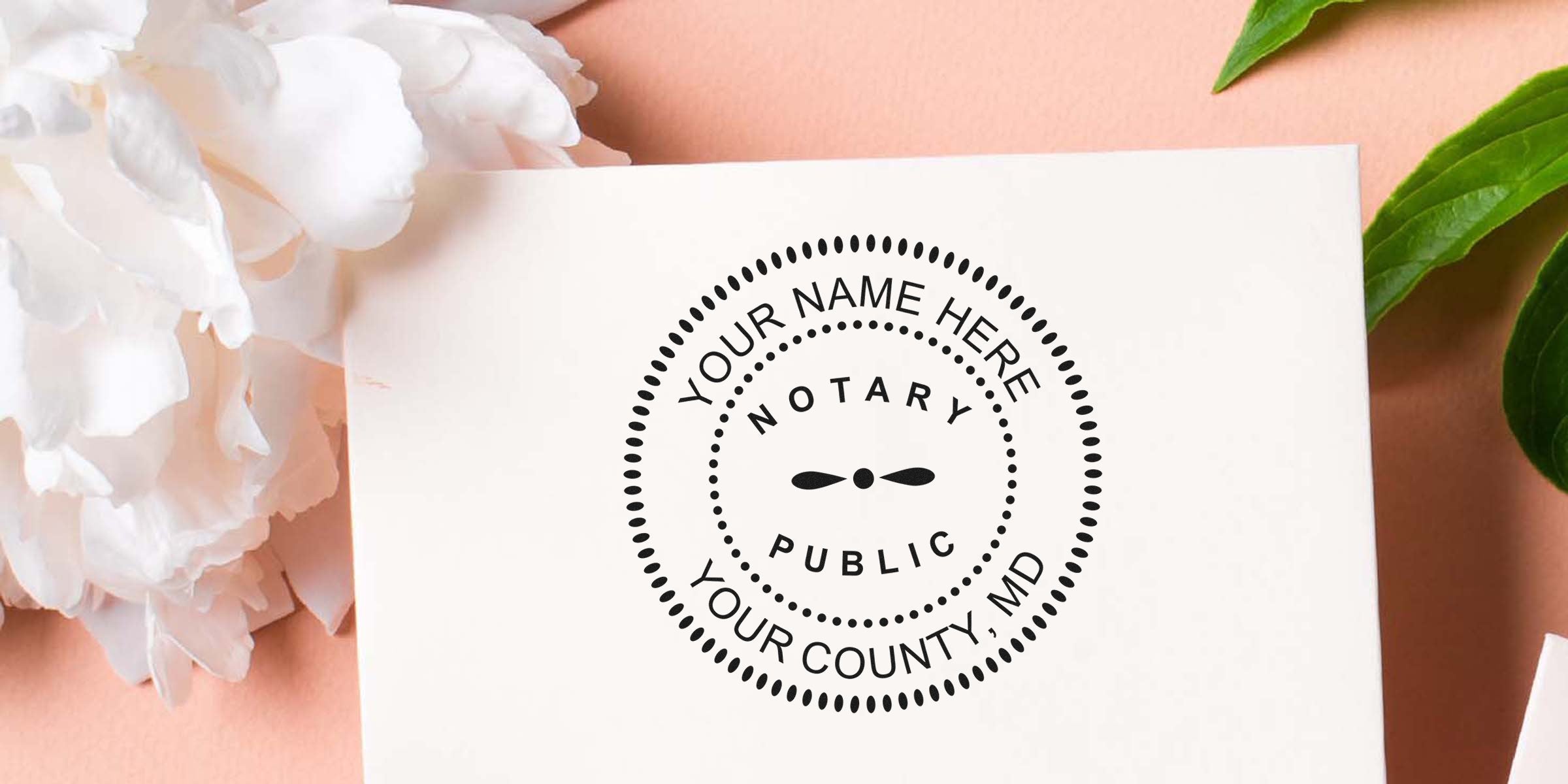 Maryland notary stamp with floral design on white paper, highlighting custom notary stamps for official document authentication.