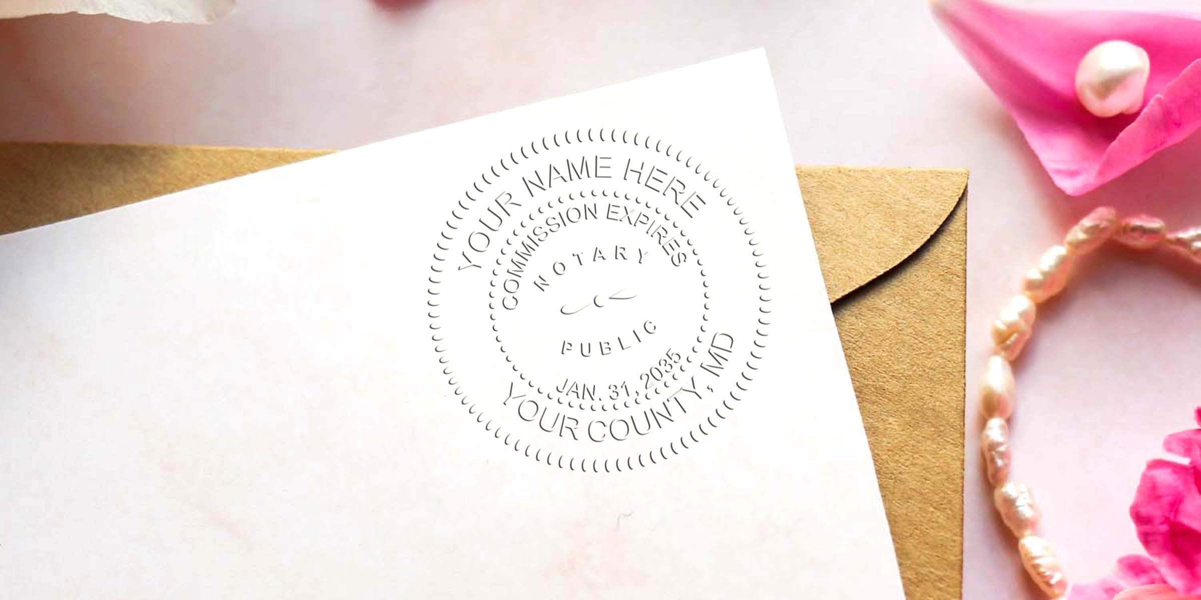 Notary public stamp on white paper with envelope and pink flowers, featuring Maryland notary supplies and quality products for certified notary services.