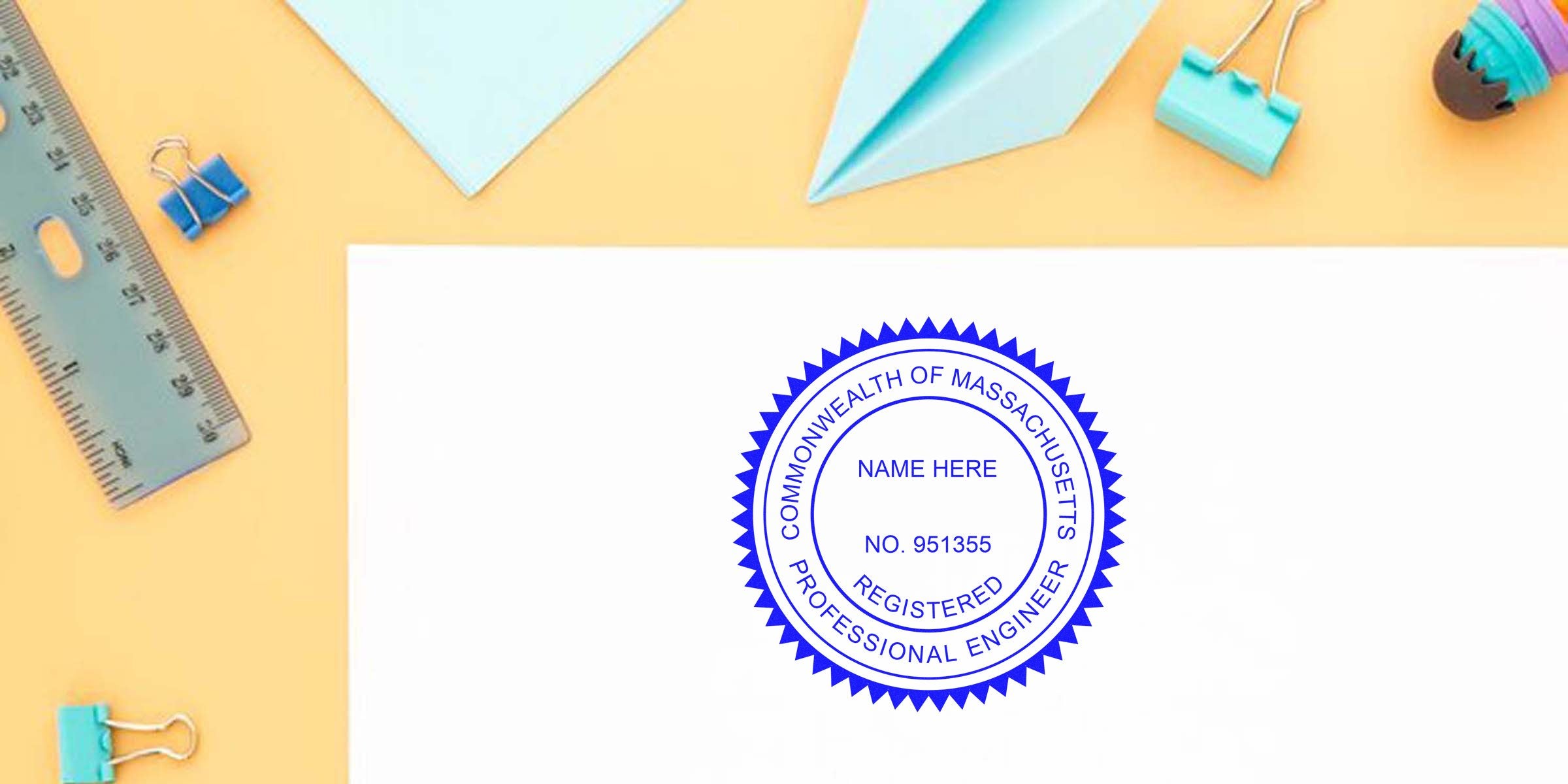 Registered Professional Engineer MA PE Seal on white paper with office supplies, highlighting PE Seal details.