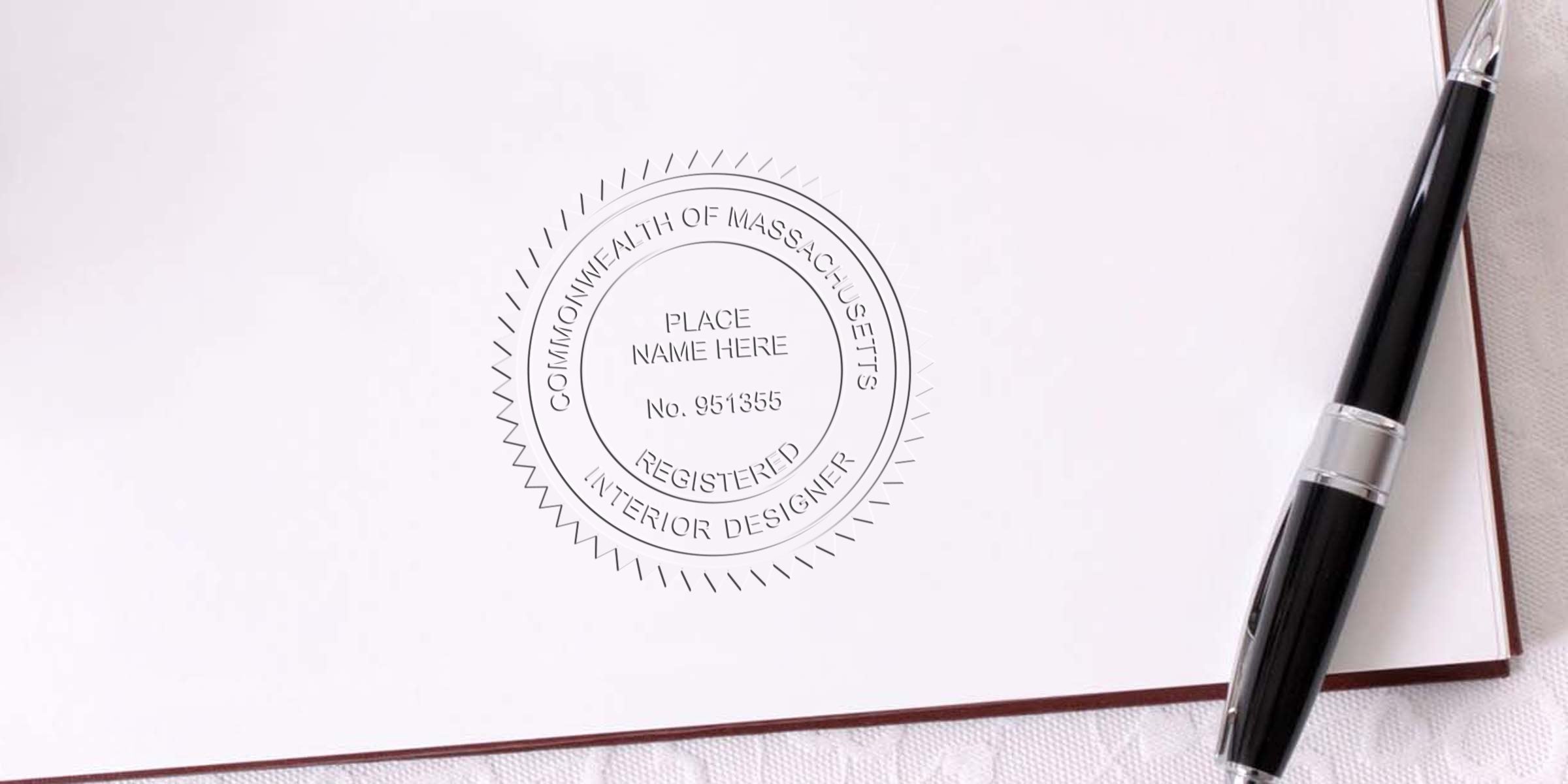 Massachusetts interior designer certification seal with pen on white paper, crafted by a seal maker.