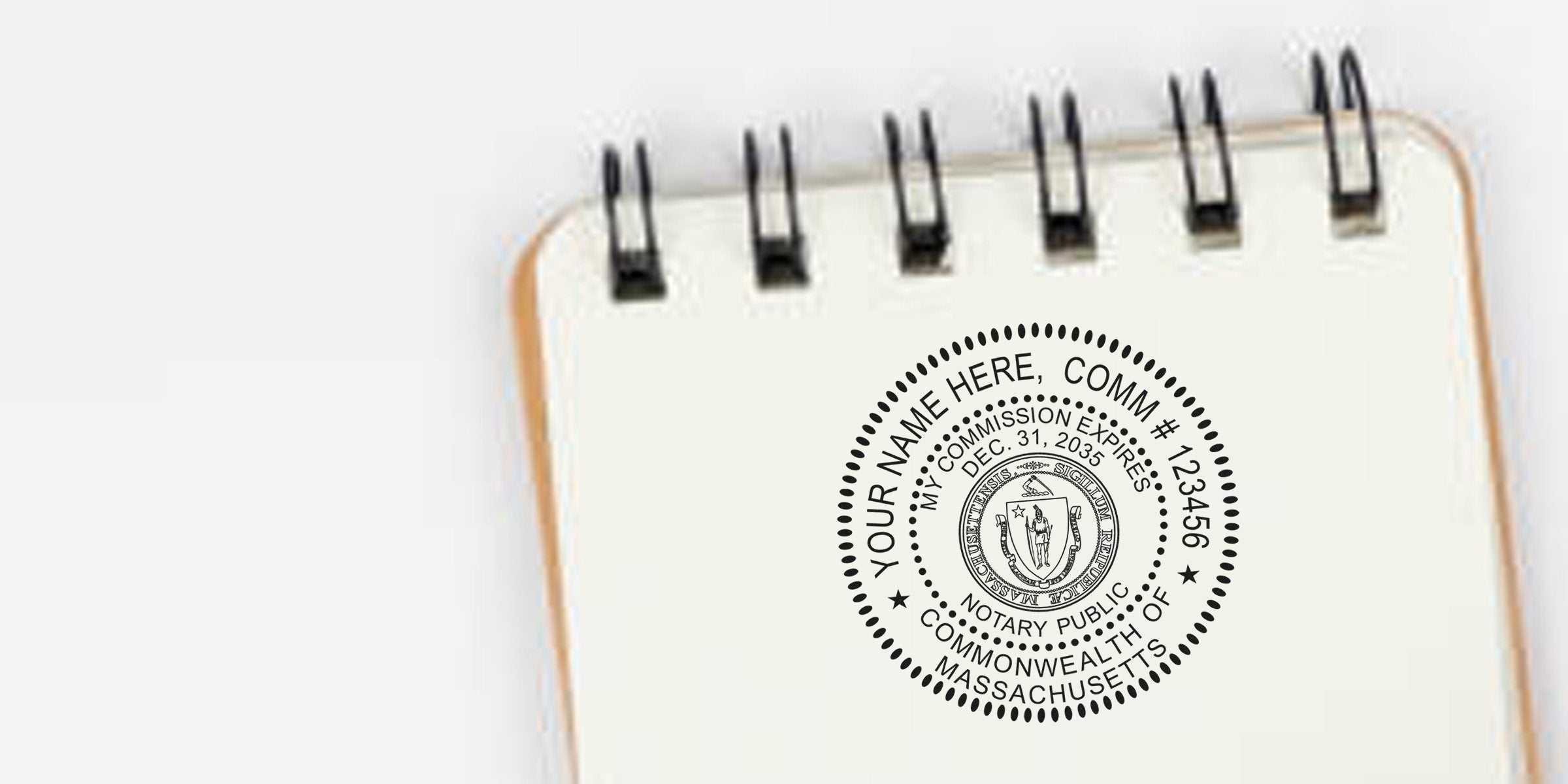 Massachusetts notary stamp with commission number and expiration date on a notebook page, available for purchase online.