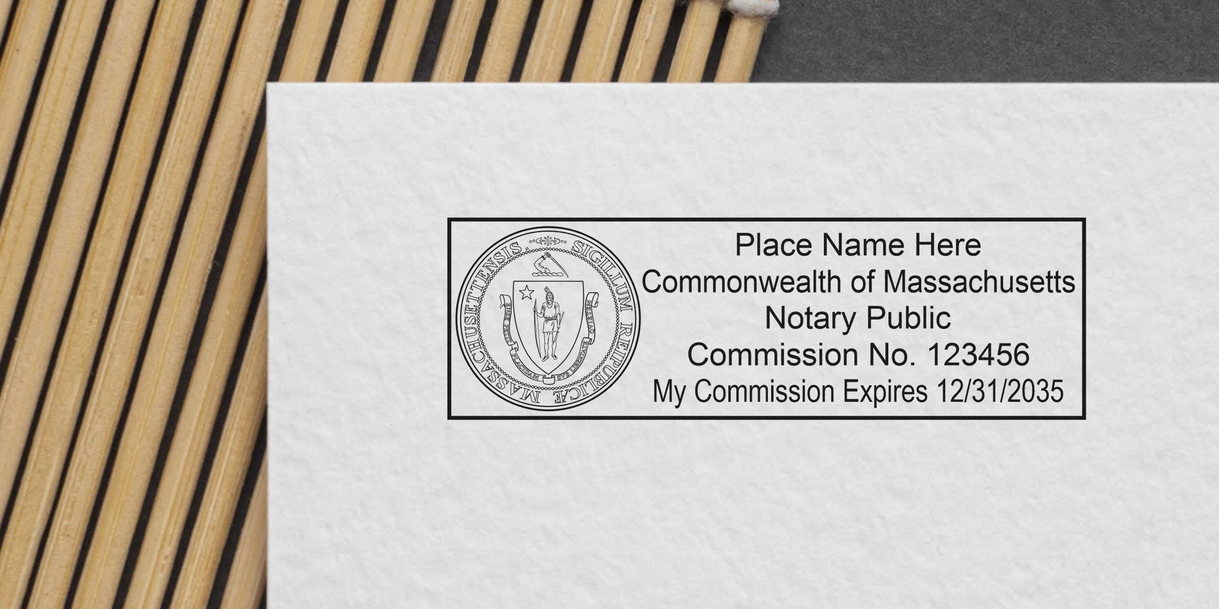 Massachusetts notary public stamp on white paper showing commission number and expiration date, key Massachusetts notary supplies and essentials.