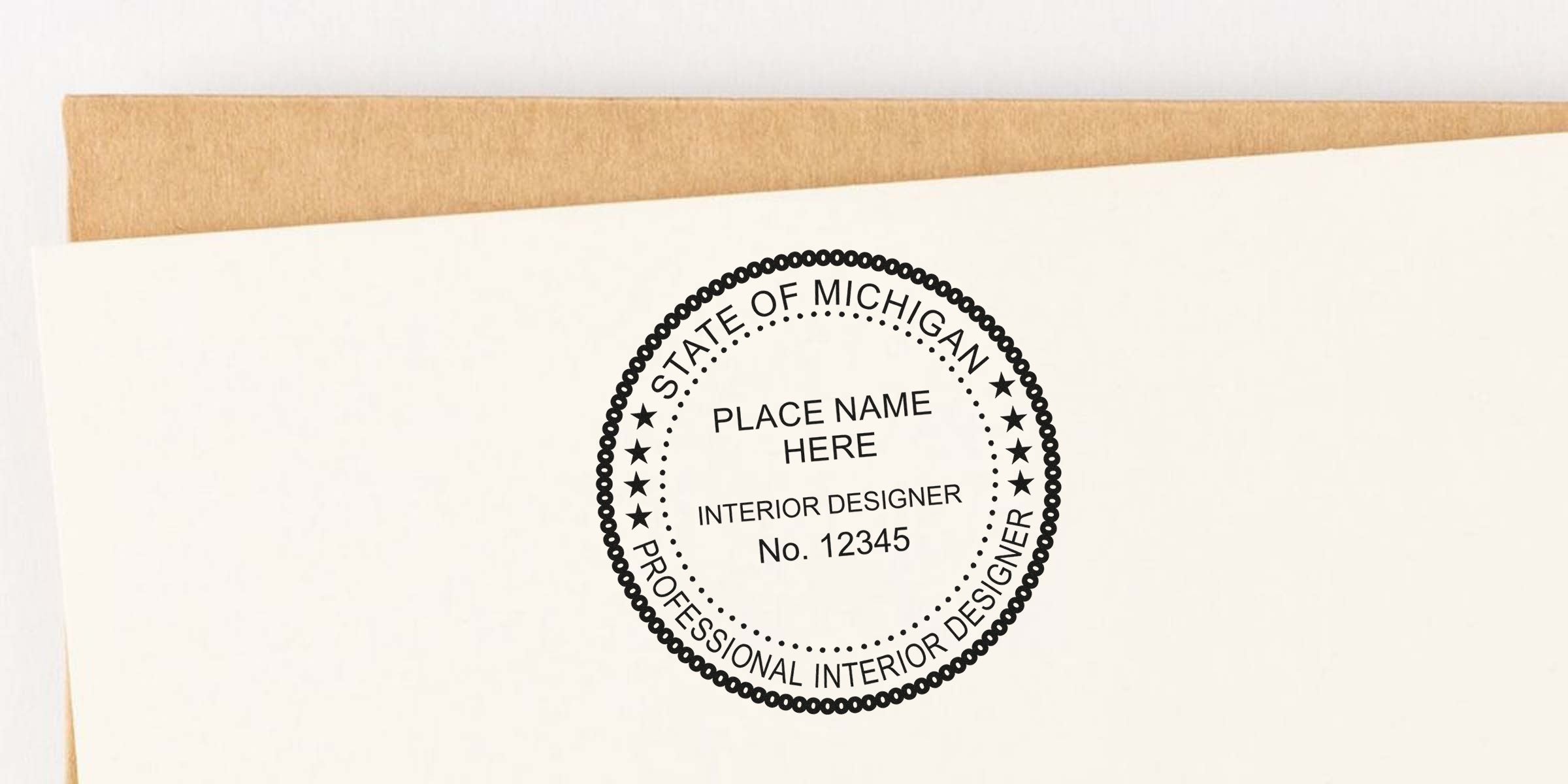 Michigan interior designer stamp embossing paper with professional license number.