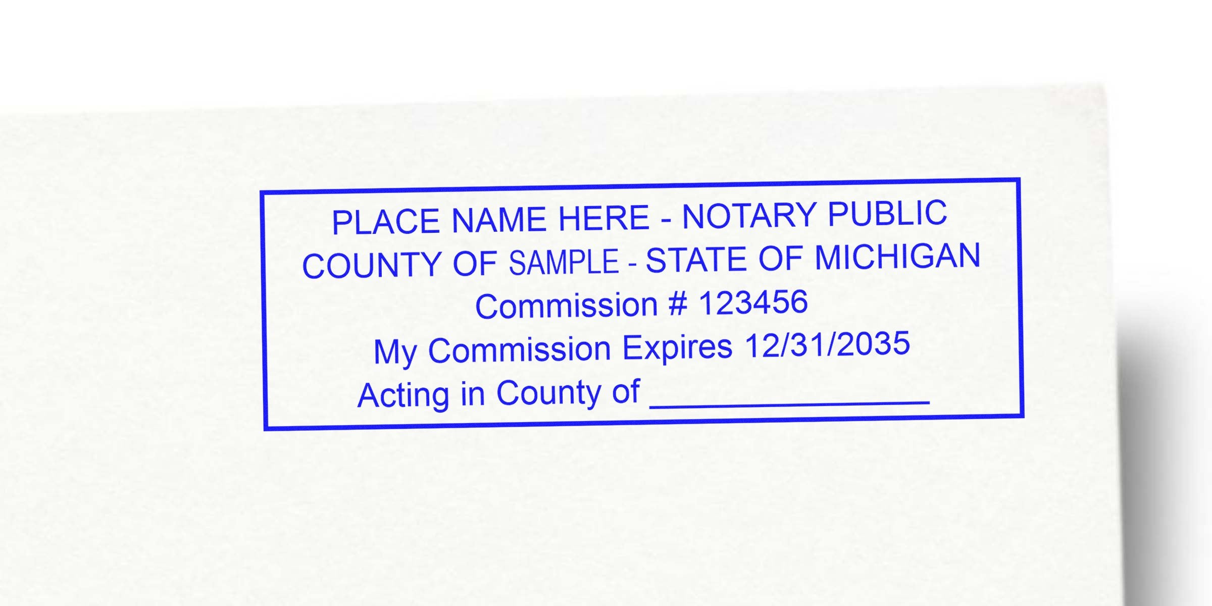 Michigan notary stamp on white paper shows commission number and expiration date, emphasizing stamp renewal and key notary renewal tips.