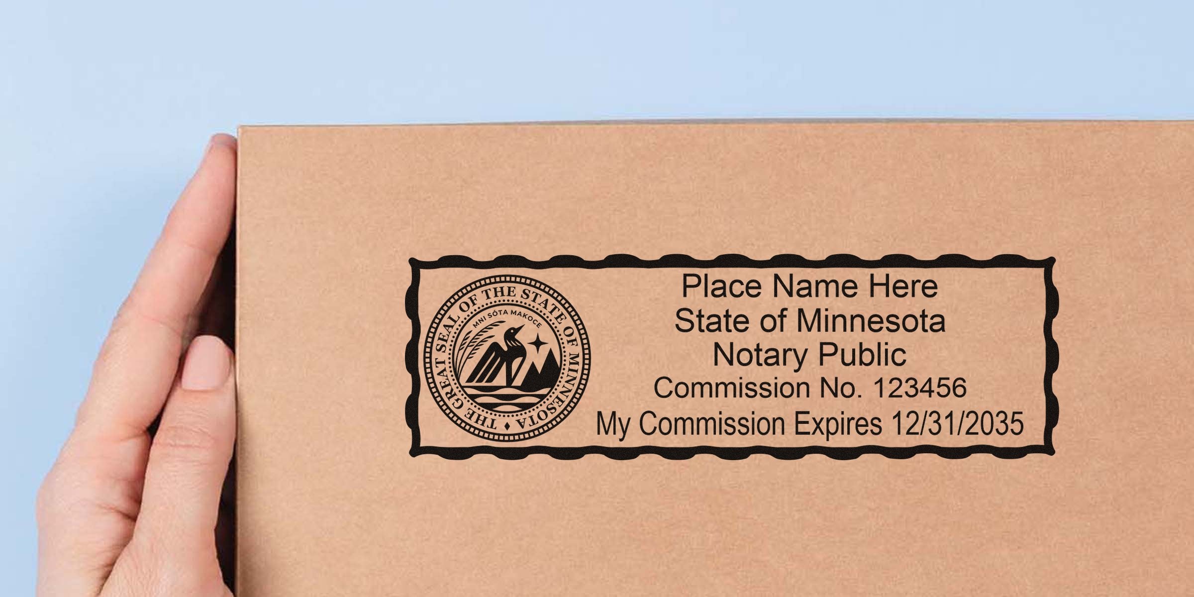 Minnesota notary seal stamp on cardboard box displaying commission number and expiration date, part of online notary supplies.