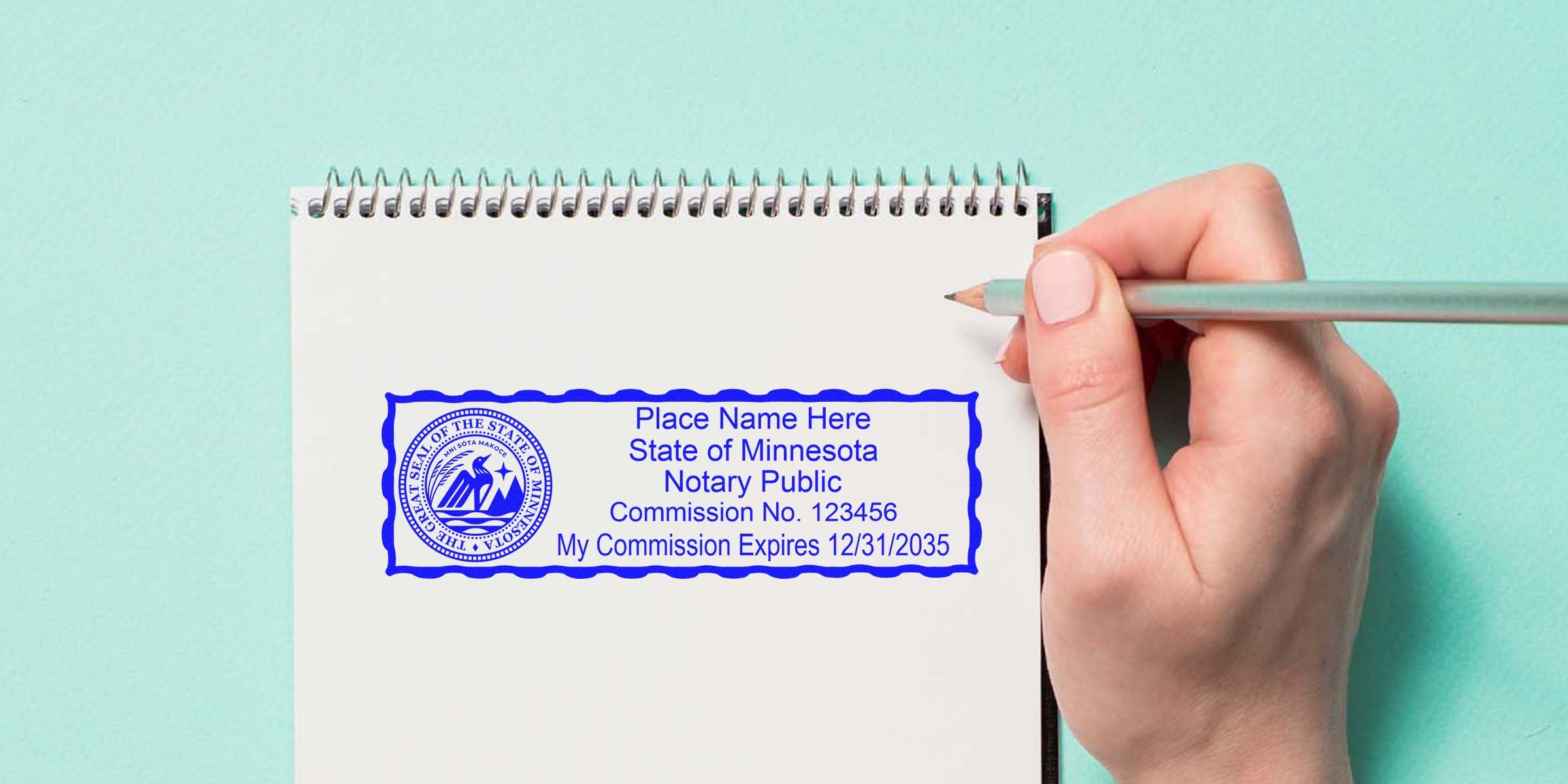 Minnesota notary stamp on white notepad with hand holding pencil, showing notary stamp requirements for commission verification.