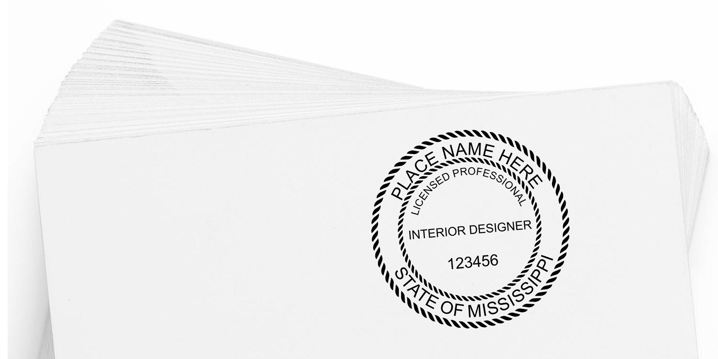 Mississippi interior designer’s custom stamp on white paper showing professional certification and license number.