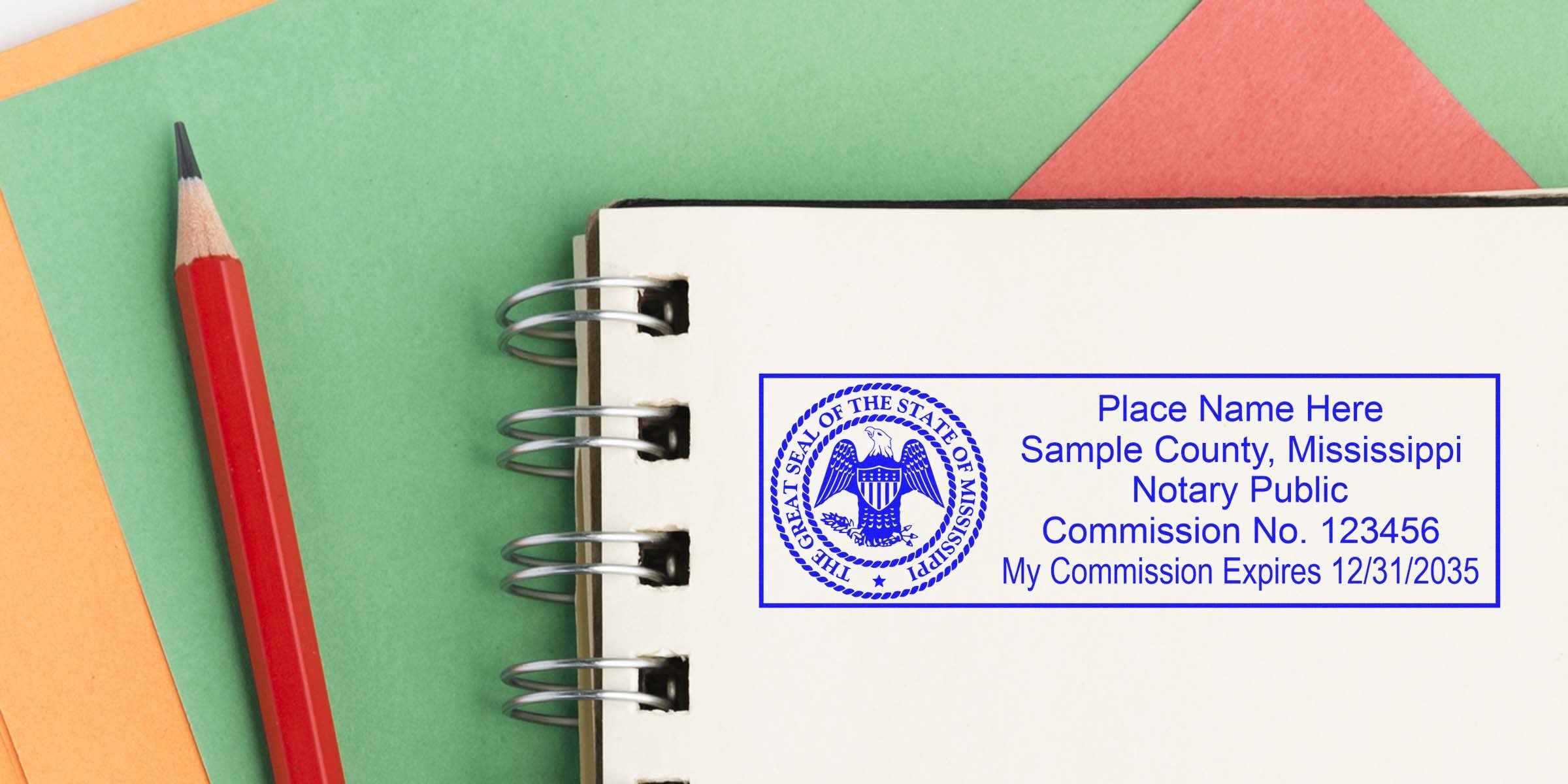 Mississippi notary stamp with commission number and expiration date on a notebook page next to a red pencil, showing a trusted notary seal.