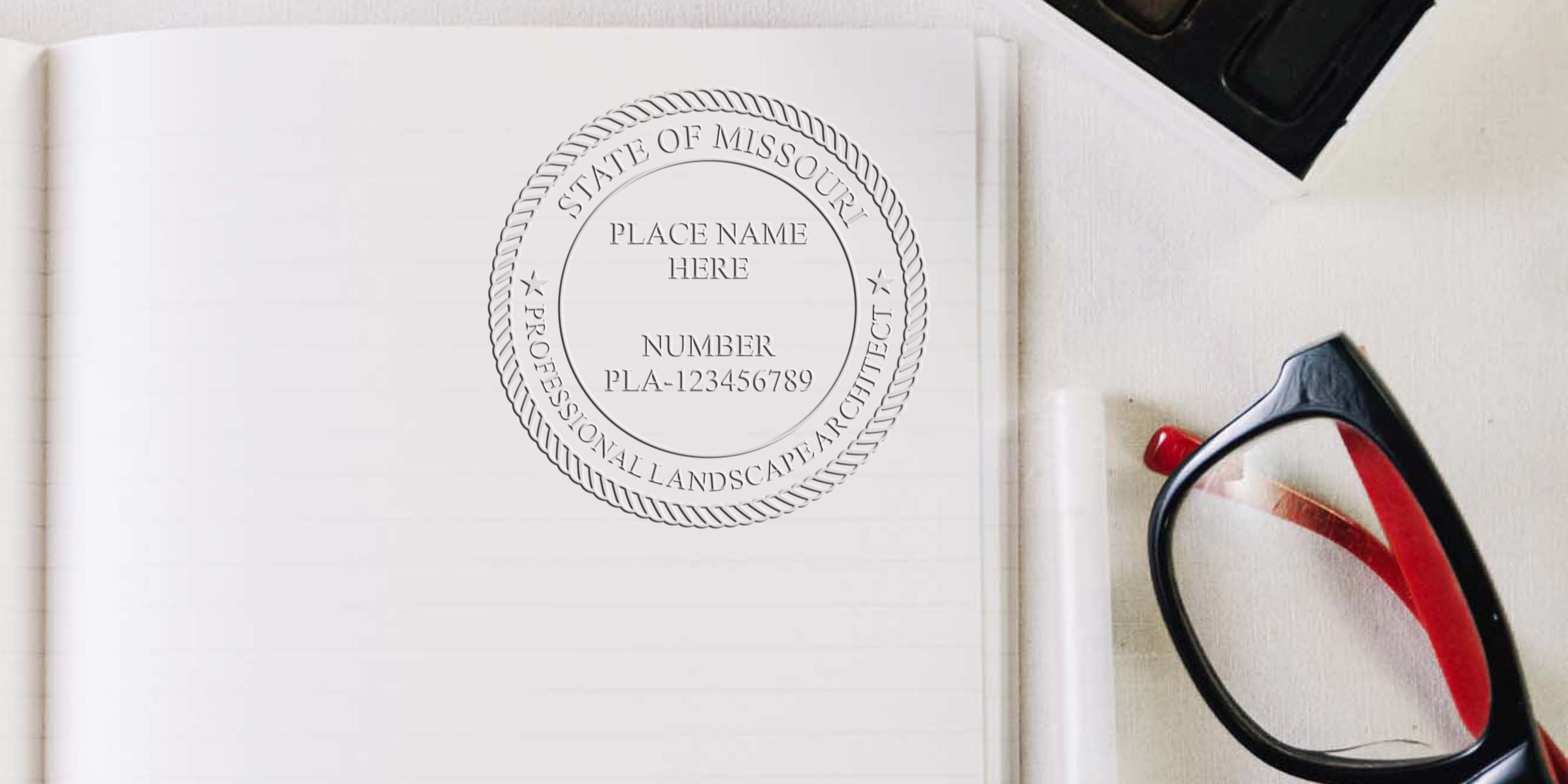 Missouri landscape architect seal on notebook with glasses and keyboard, highlighting seal design rules and certification verification.