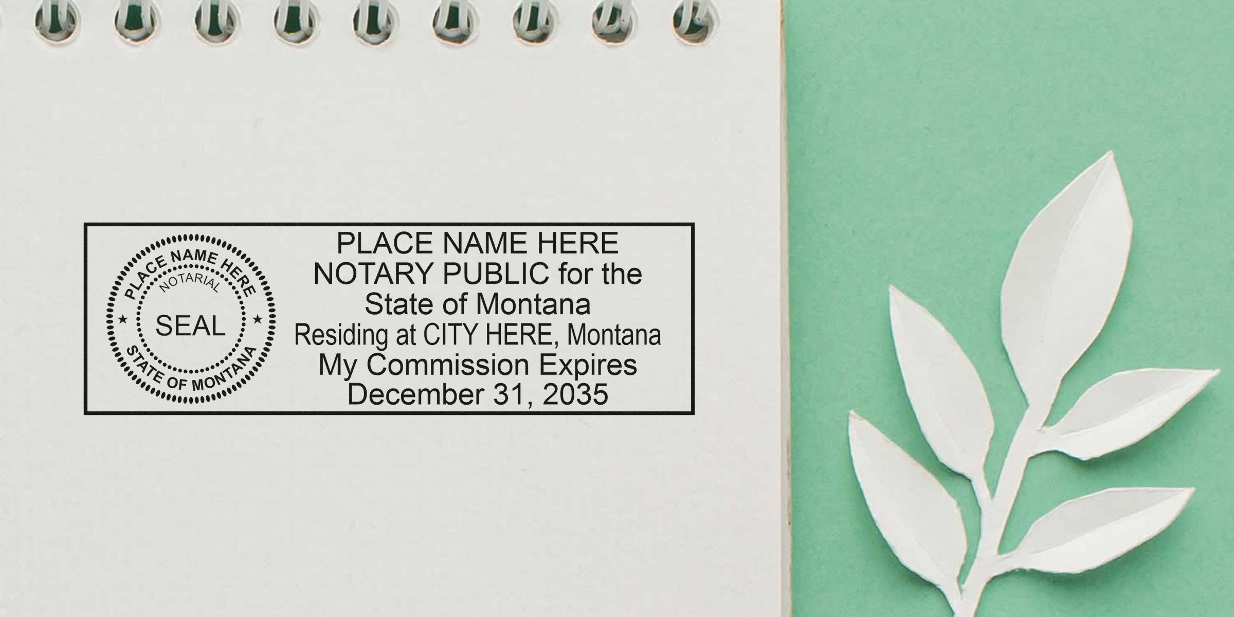 Montana notary seal with commission expiry on white notepad, placed on green background with paper leaf, illustrating Montana notary public rules.