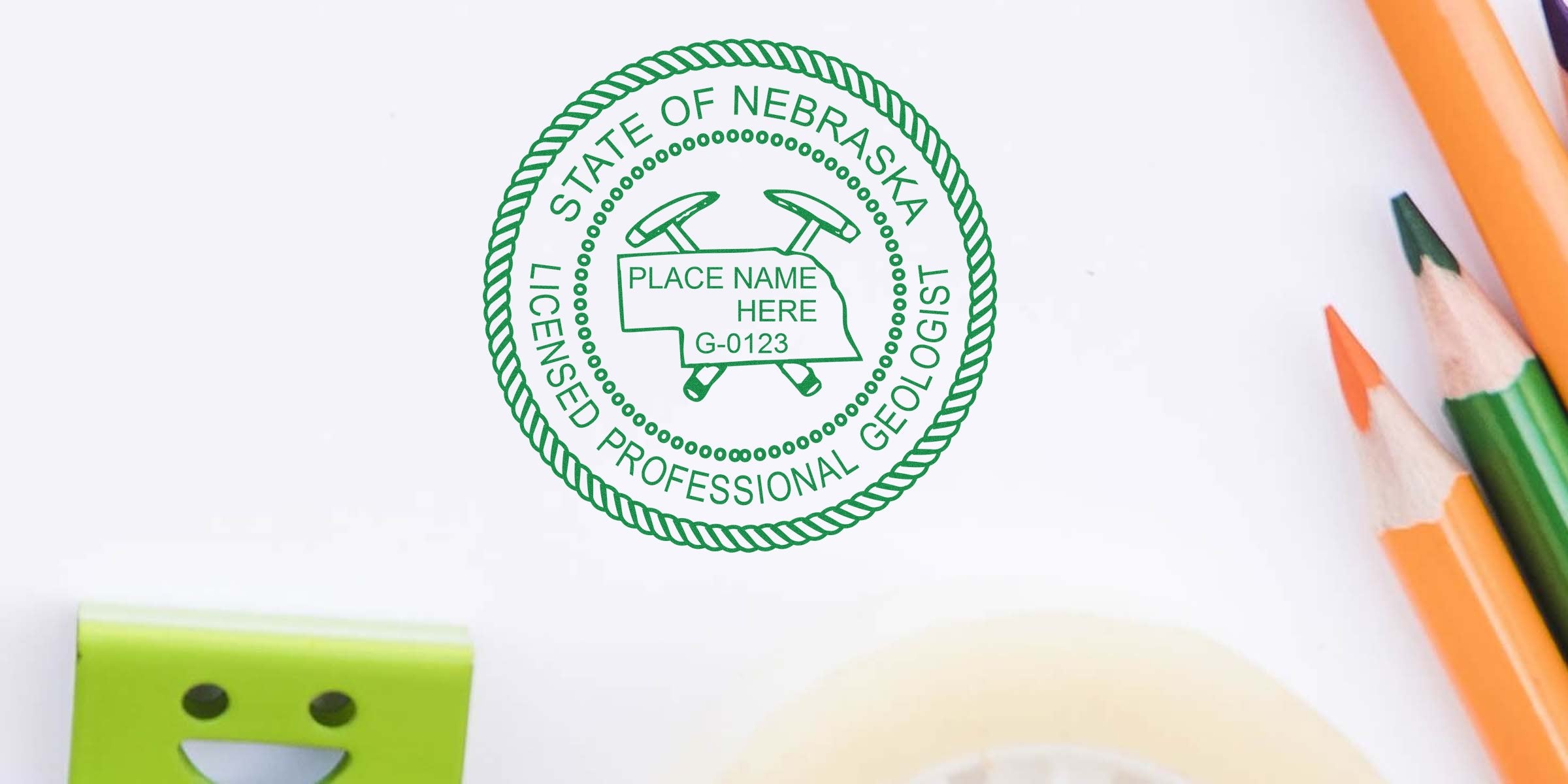 Nebraska geologist seal with colored pencils and office supplies on white background, highlighting purchase requirements.