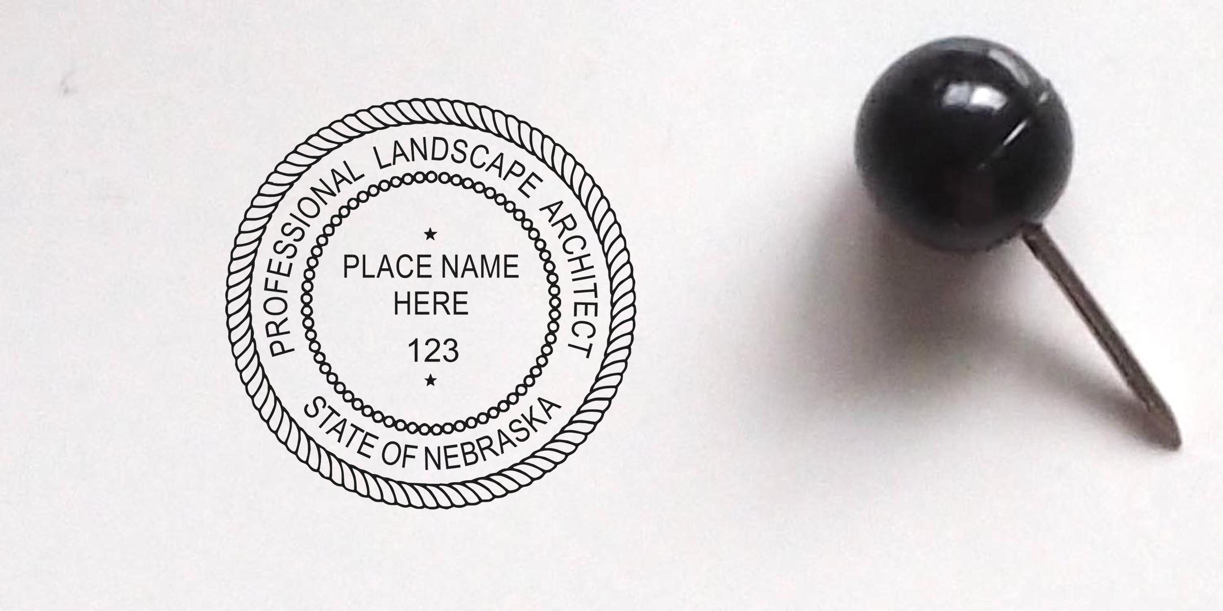 Professional Nebraska landscape architect license seal with black push pin on white background, compliant with Nebraska stamp requirements.
