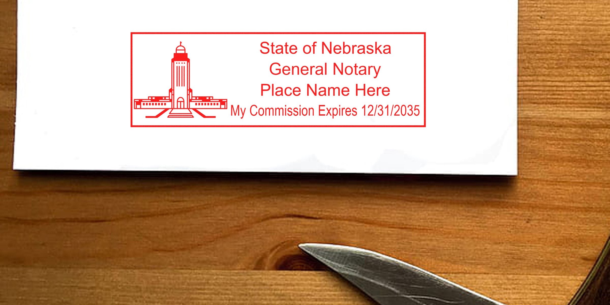 Nebraska general notary stamp on white paper with commission expiration date on wooden desk, emphasizing Nebraska notary stamp renewal and renewal requirements.