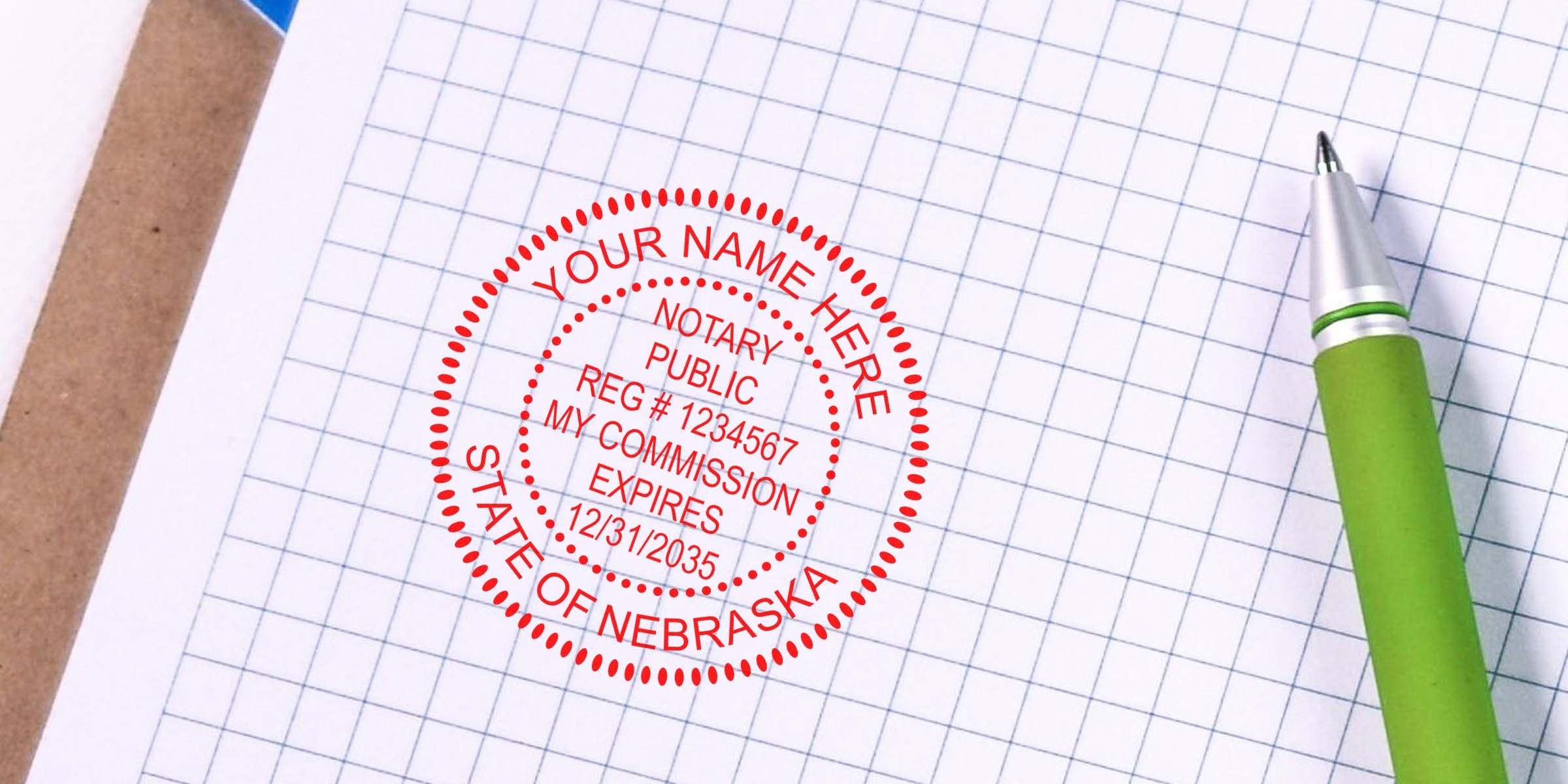 Nebraska notary stamp on graph paper with green pen, highlighting trusted notary supplies for commission verification and services.