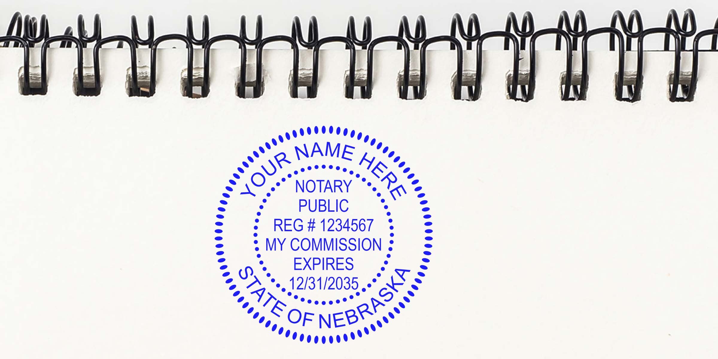 Nebraska Notary Public Seal stamped on white spiral notebook paper with commission expiration date; includes essential Notary Seal purchase tips.