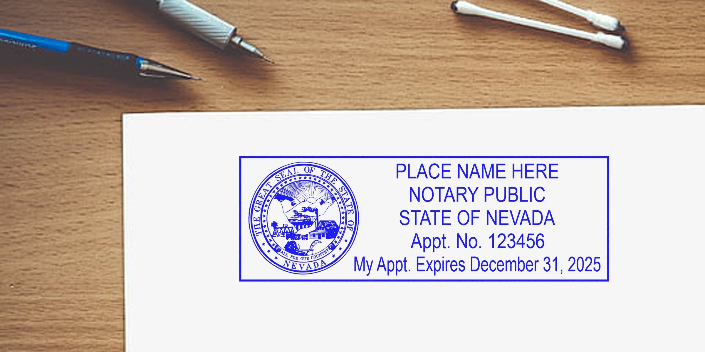 Nevada notary public stamp with state seal on wooden desk, surrounded by pens and cotton swabs, related to Nevada notary stamp and renewal requirements.