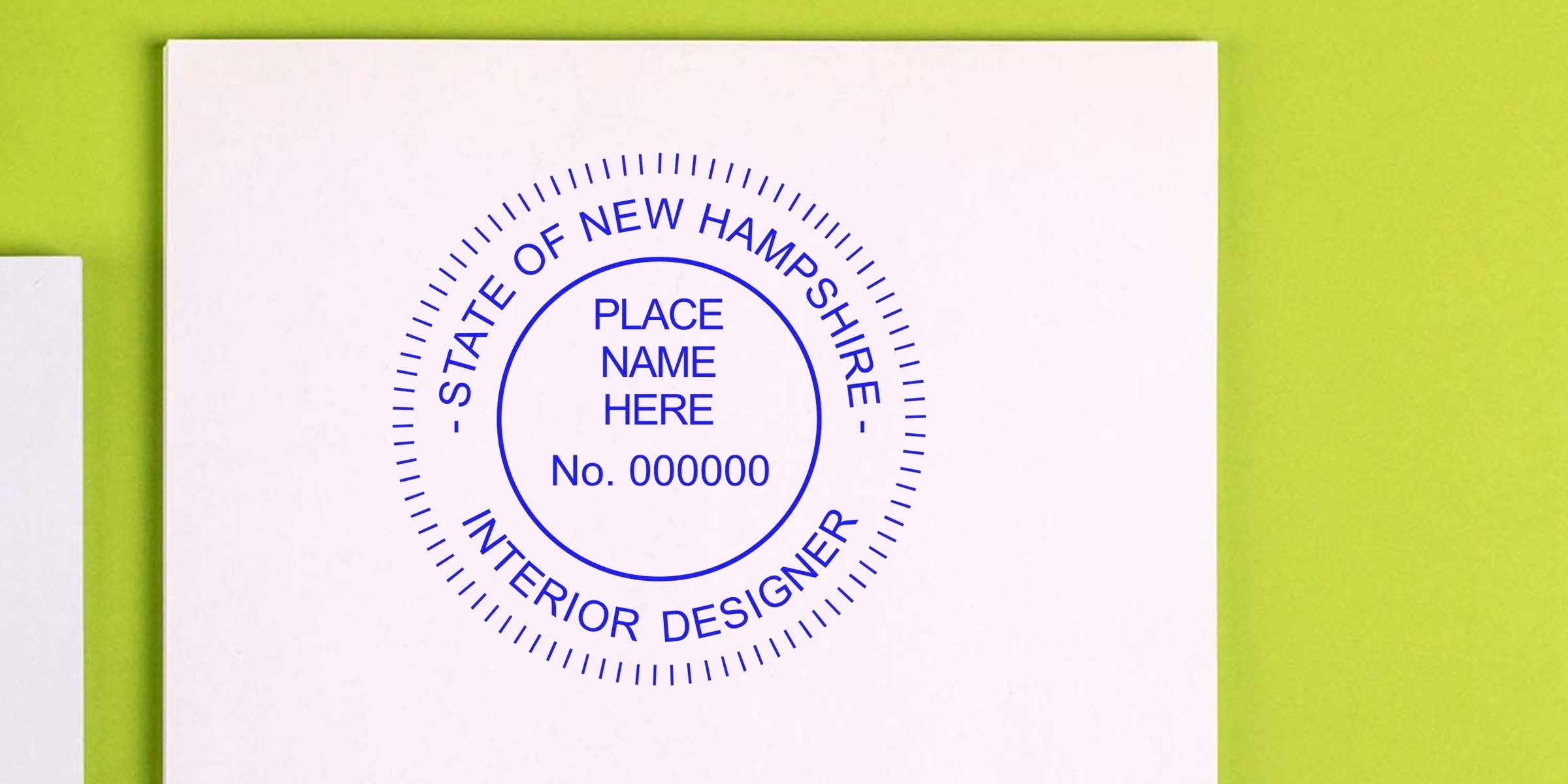 New Hampshire interior design certification stamp on white paper with state seal for license verification, per stamp design guidelines.