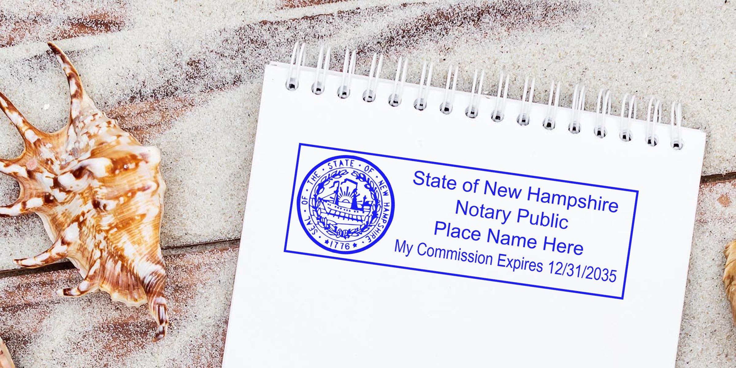 New Hampshire notary stamp on white notebook with seashells on sand, highlighting key NH notary supplies.