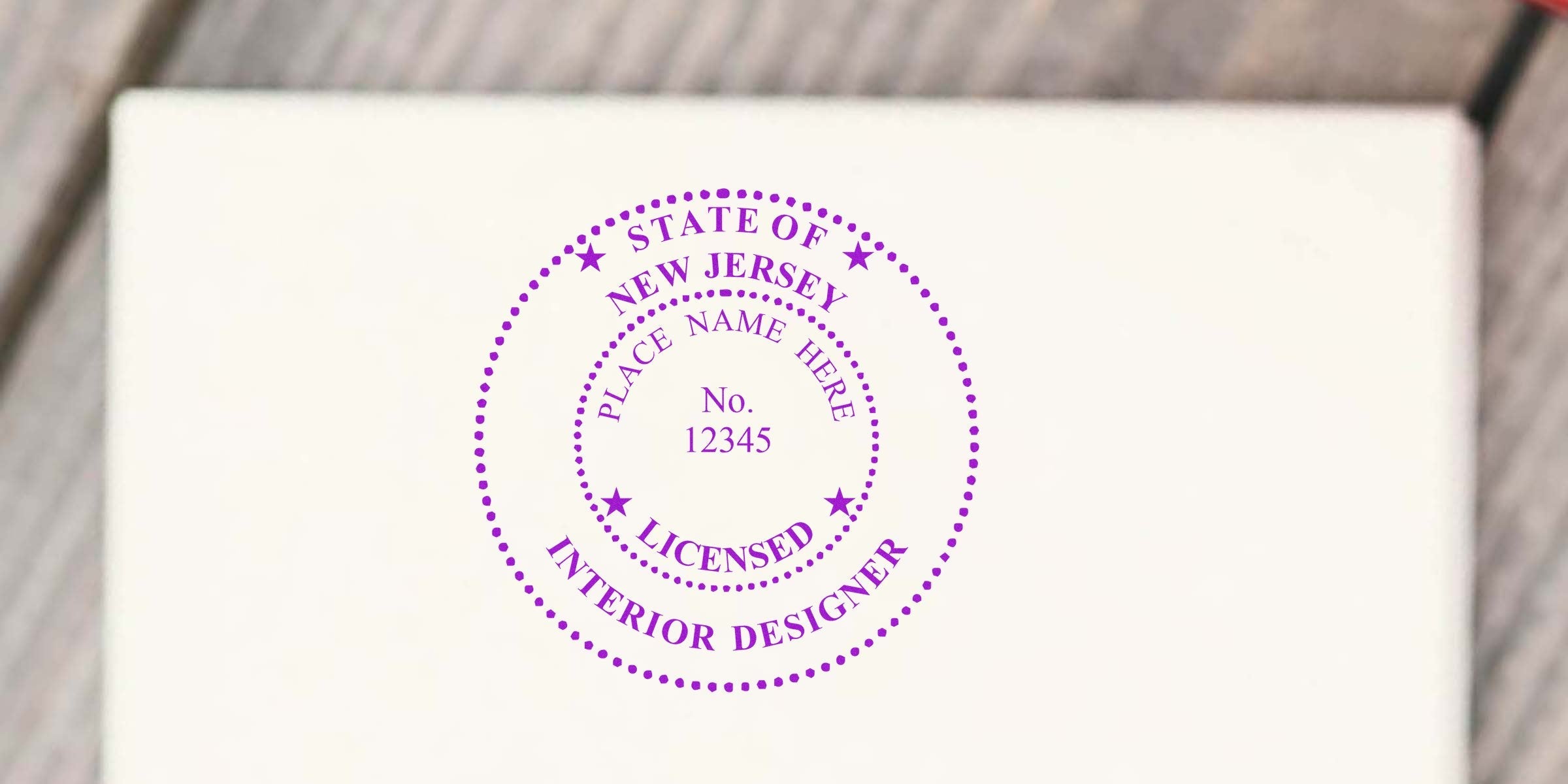 Purple New Jersey interior designer seal on white background, compliant with NJ interior design seal standards.