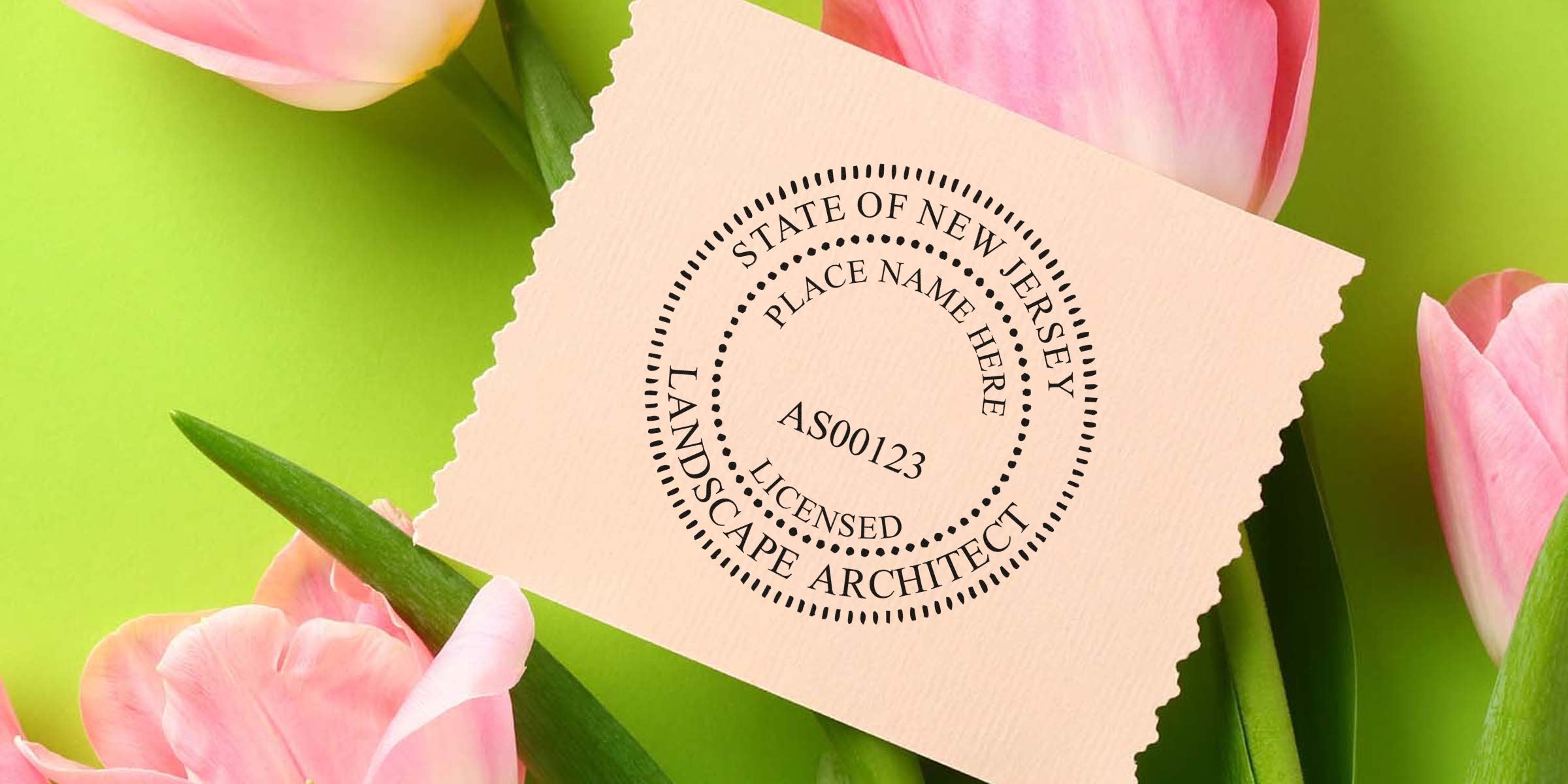 New Jersey landscape architect stamp on paper with pink tulips and green background, showcasing the NJ landscape architect licensing process.