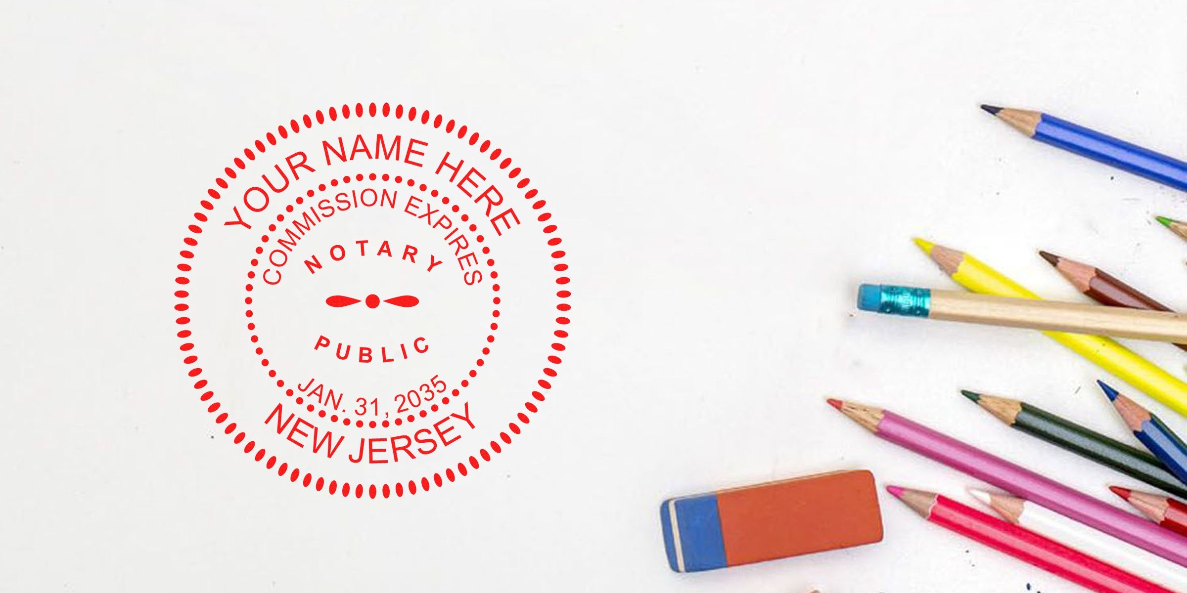 New Jersey notary public stamp with colored pencils and eraser on white background, part of a beginner’s notary kit with essential supplies.