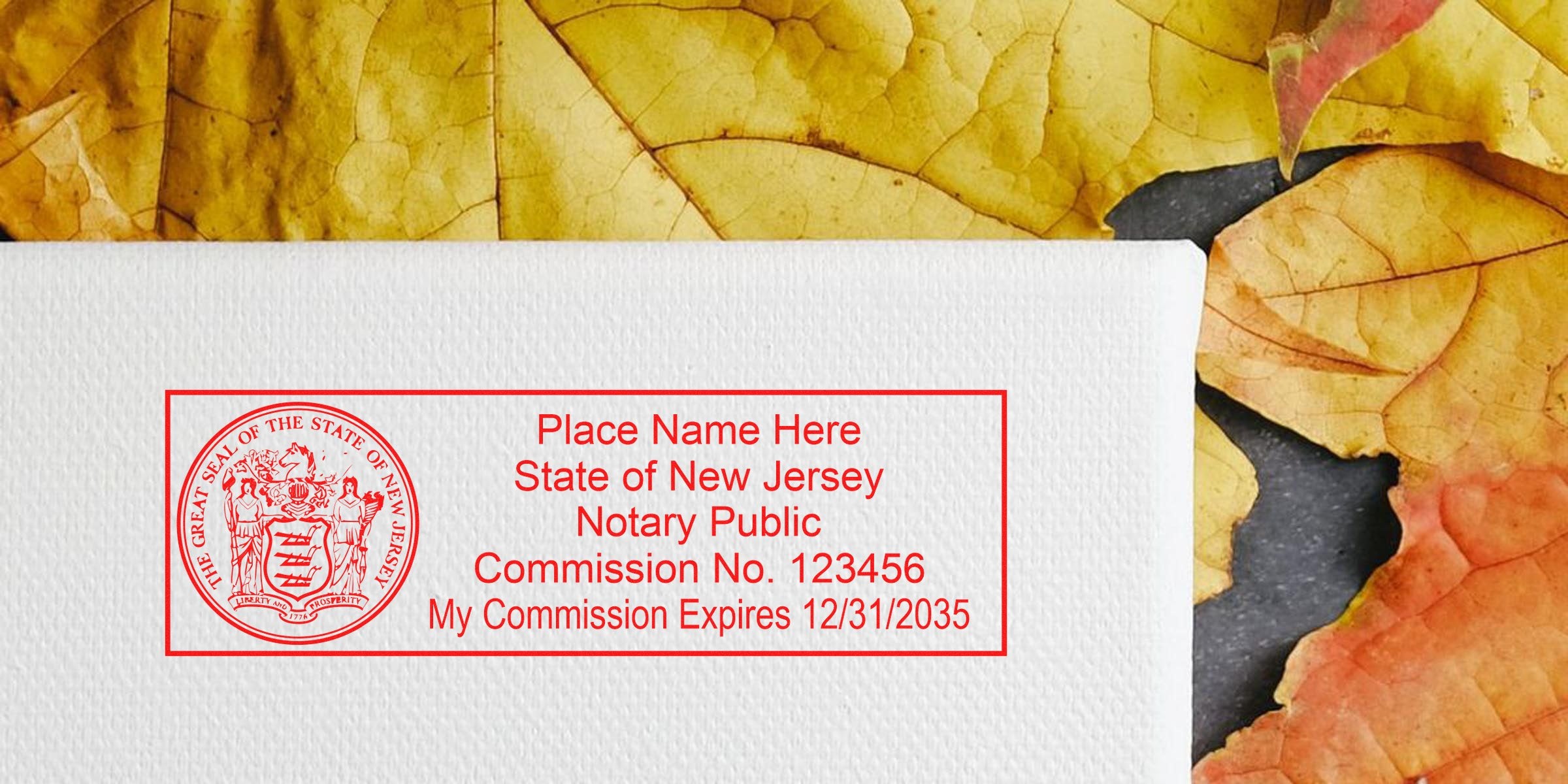 New Jersey notary stamp with commission number and expiration date on white paper, surrounded by autumn leaves, showcasing affordable notary tools and NJ notary supplies.