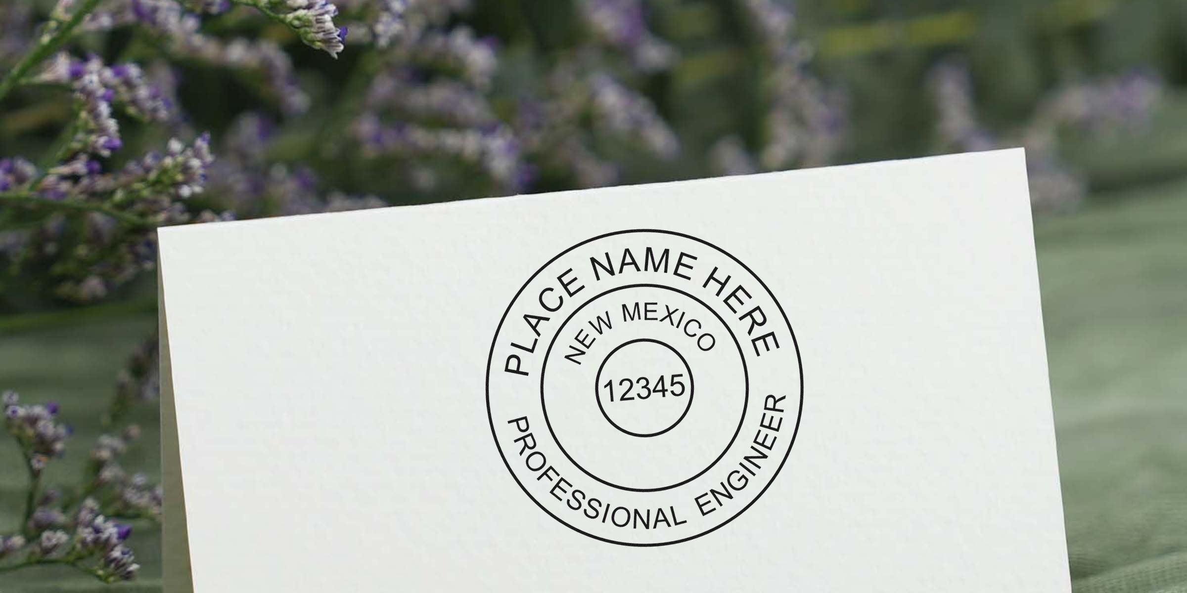 New Mexico PE stamp on white paper with floral background, displaying the New Mexico professional engineer seal and meeting all PE stamp criteria.