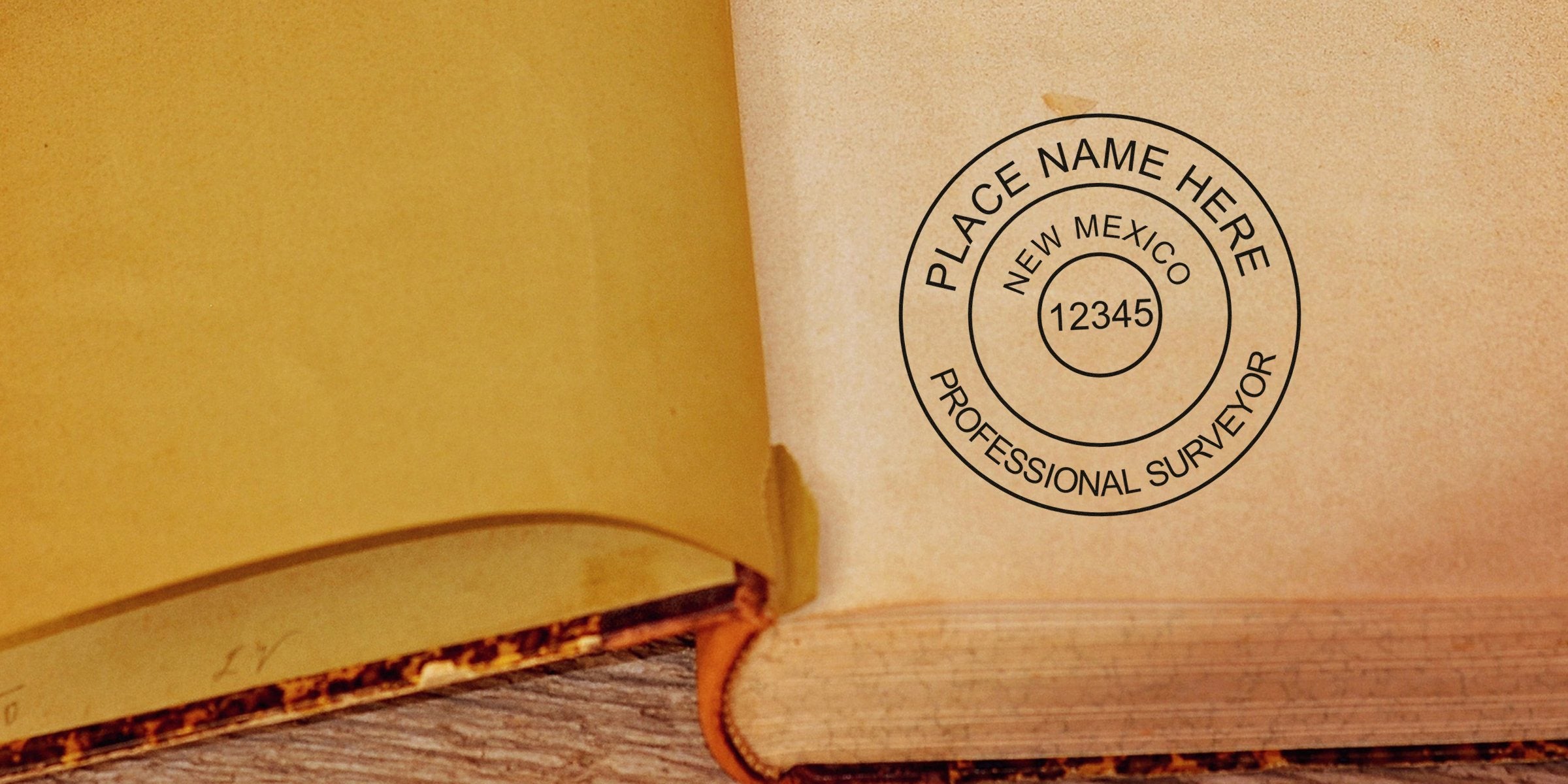 New Mexico land surveyor stamp on an old book page, emphasizing the requirements for professional land surveyors.