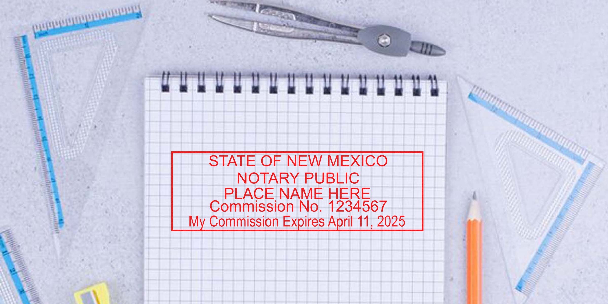 New Mexico notary public stamp on graph paper, surrounded by notary supplies and essentials like drafting tools and a pencil.