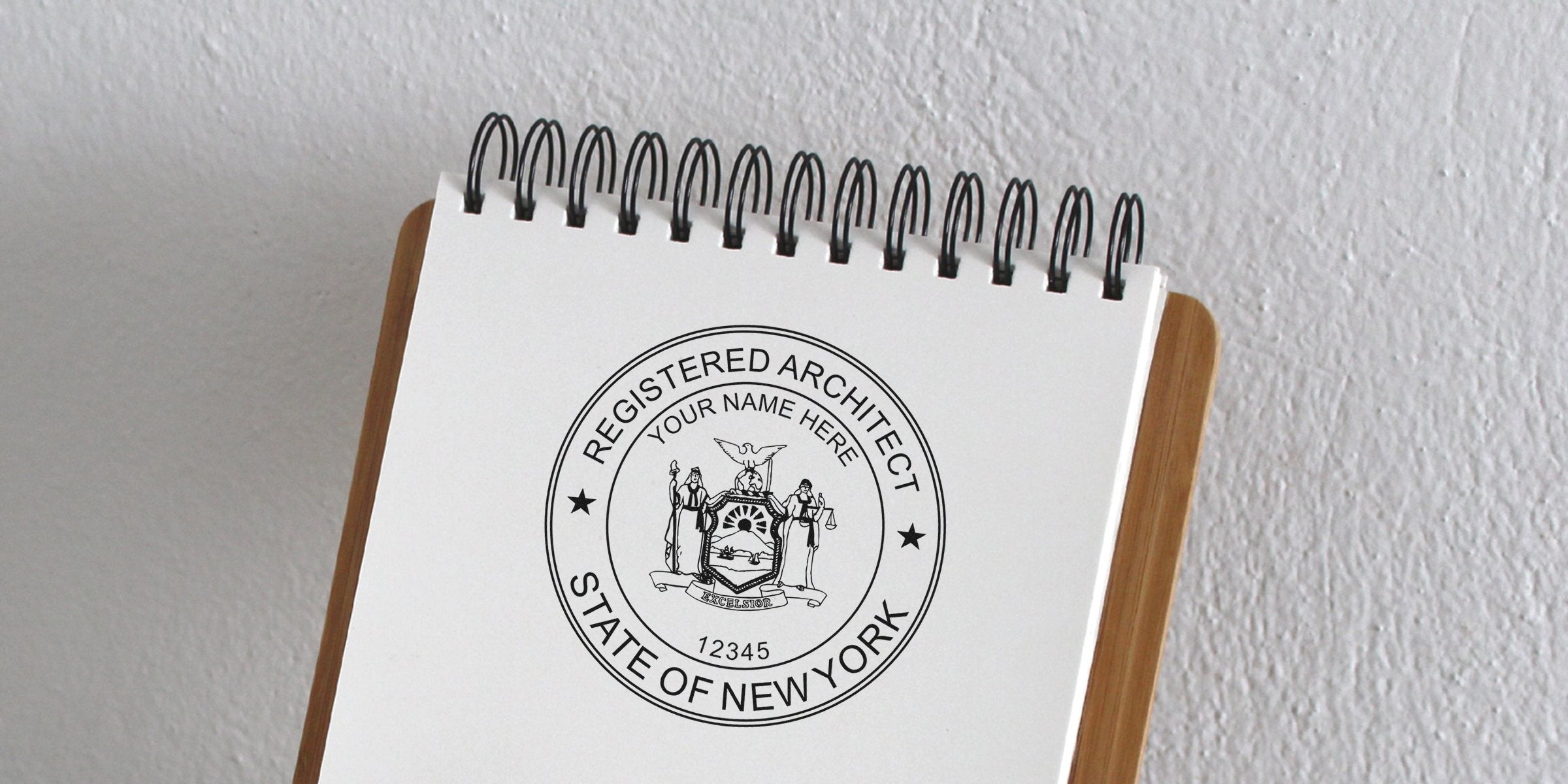 New York architect seal stamped on a spiral notebook, showing the official architecture seal and certification stamp requirements.